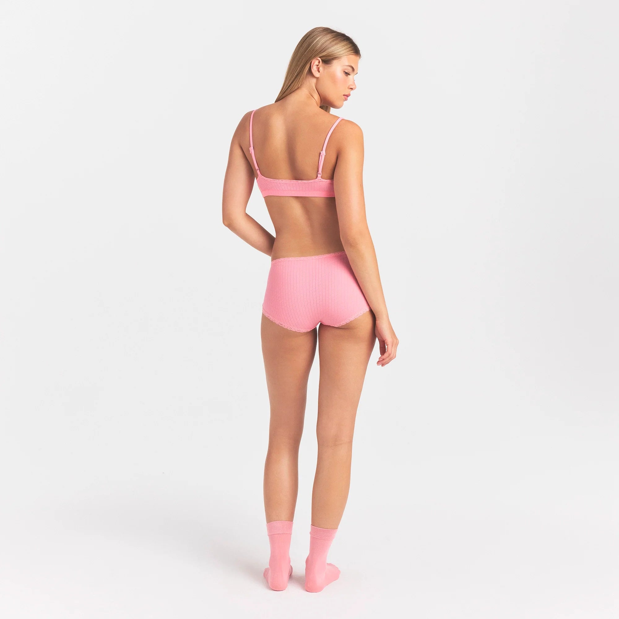 LIGHTWEIGHT COTTON POINTELLE LACE BOY SHORT | MELON TONAL ON A MODEL SIDE VIEW @ | FOCUS: 0.0, 1.0, 0.9