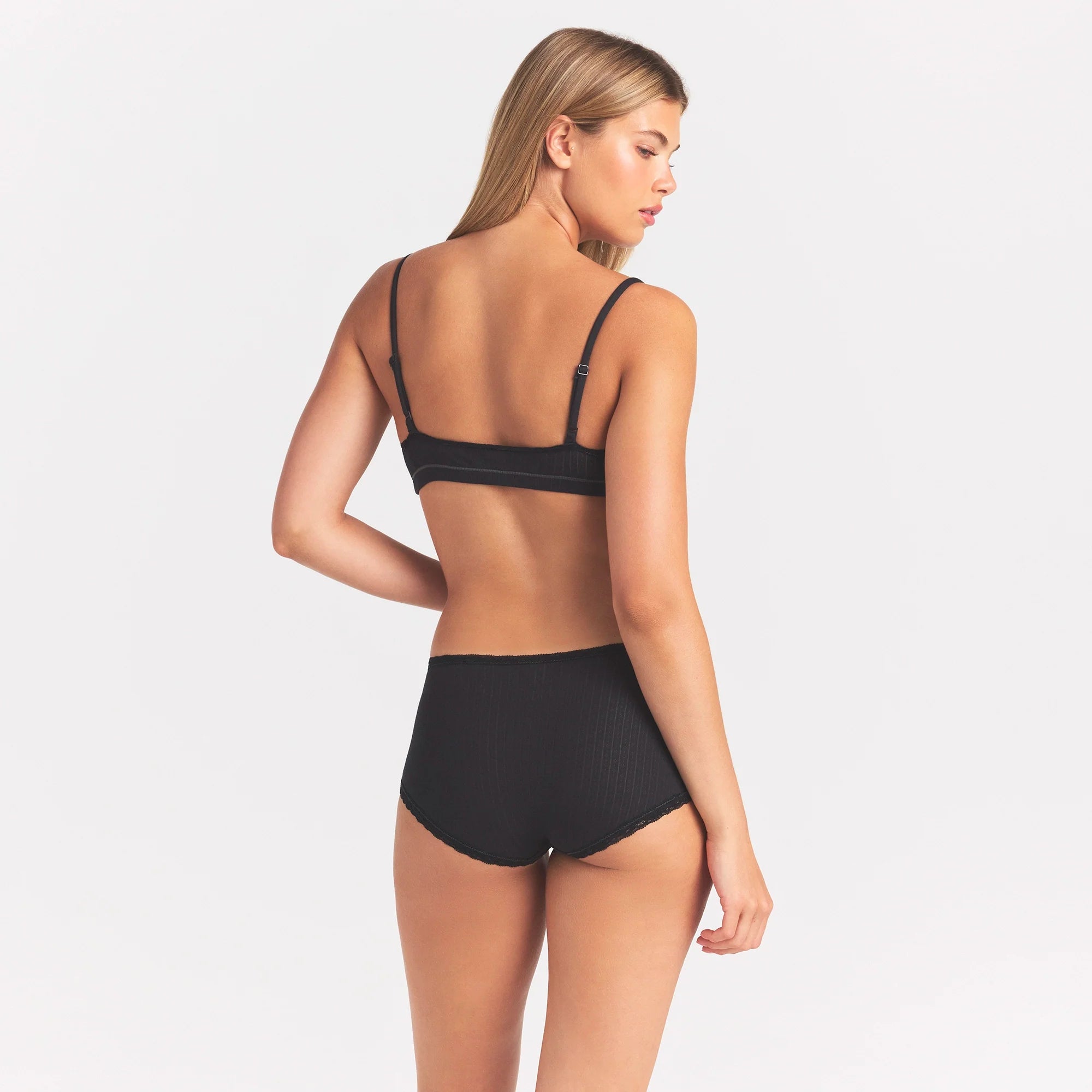 LIGHTWEIGHT COTTON POINTELLE LACE BOY SHORT | SOOT TONAL ON A MODEL SIDE VIEW @ | FOCUS: 0.0, 1.0, 0.9