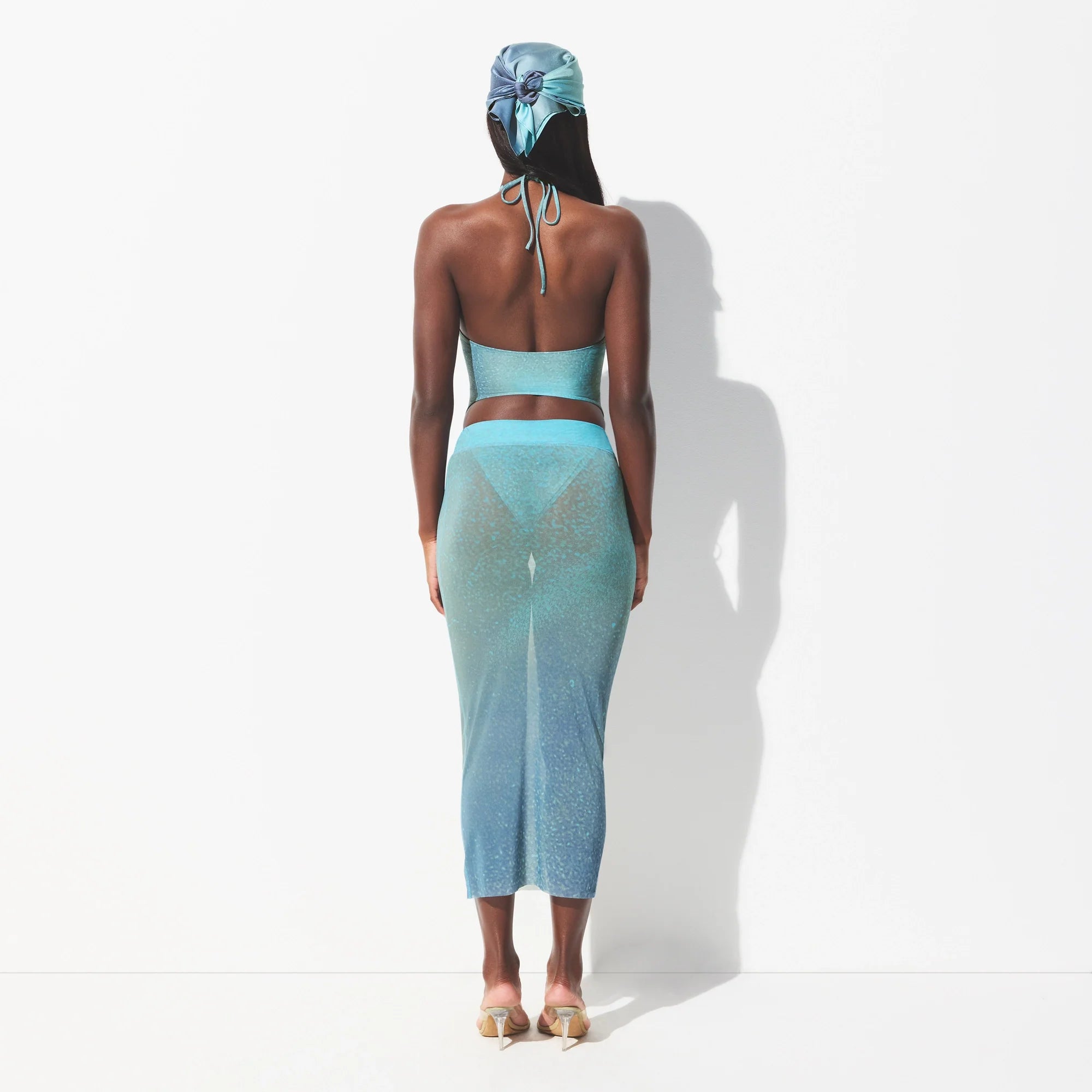 MESH COVER-UPS MIDI SKIRT | CYAN FK BODY PRINT ON A MODEL FRONT VIEW @ | FOCUS: 0.0, 1.0, 0.9 