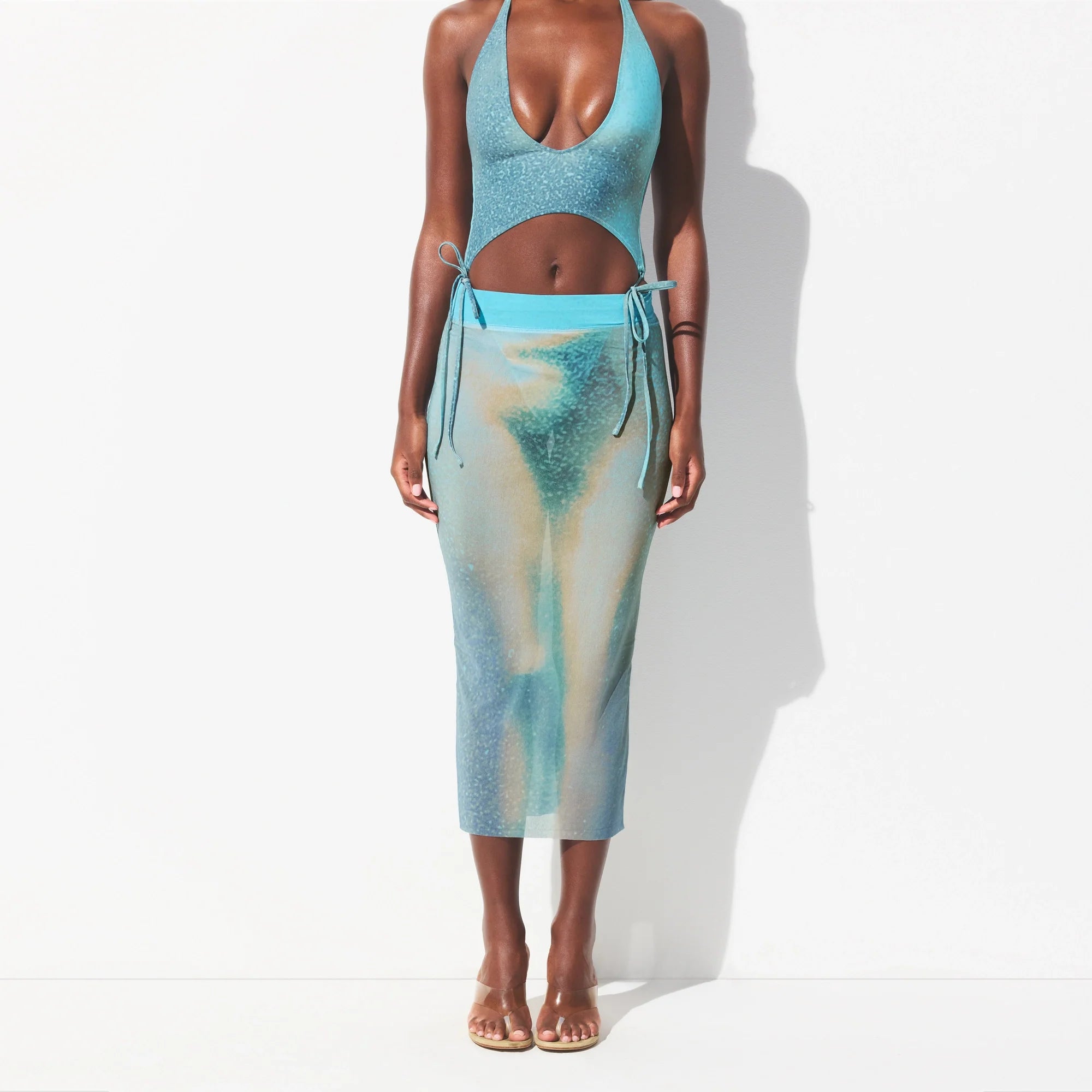 MESH COVER-UPS MIDI SKIRT | CYAN FK BODY PRINT ON A MODEL SIDE VIEW @ | FOCUS: 0.0, 1.0, 0.9 