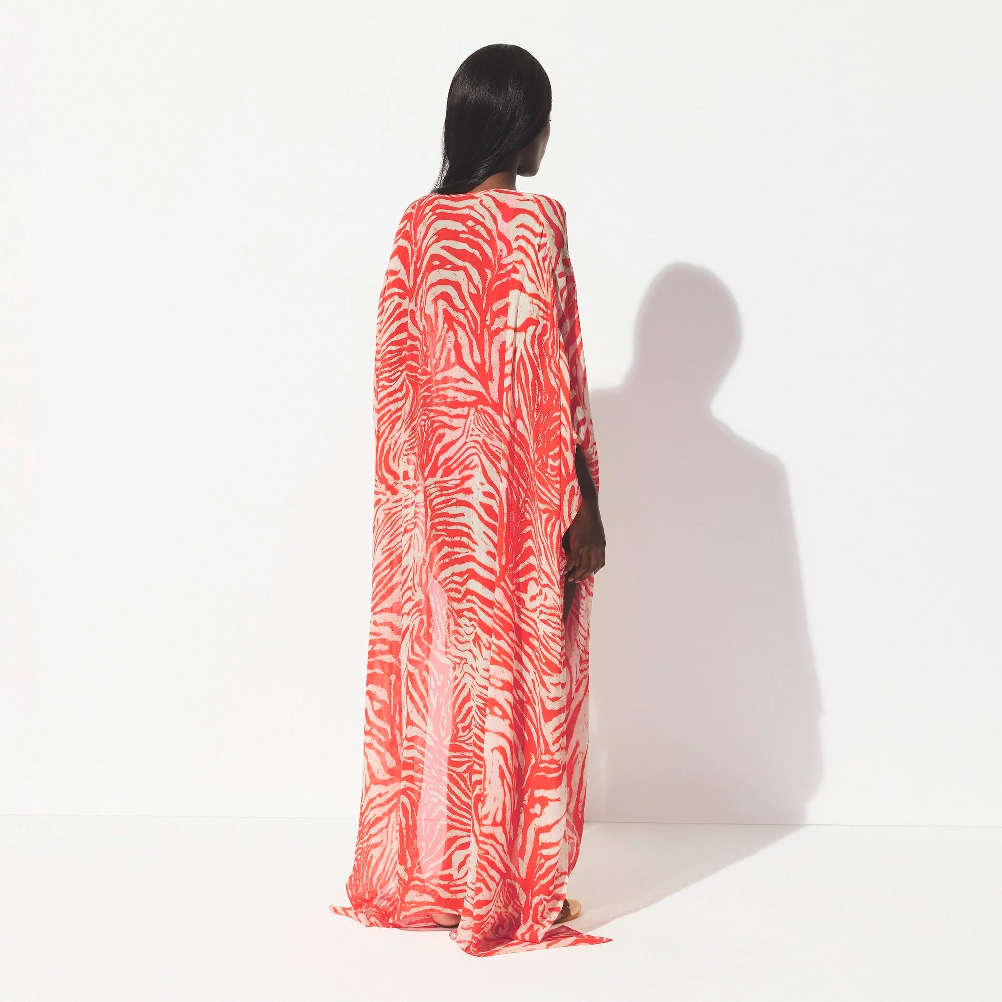 SHEER COVER-UPS LONG KAFTAN | CARMINE ZEBRA PRINT ON A MODEL SIDE VIEW @ | FOCUS: 0.0, 1.0, 0.9 