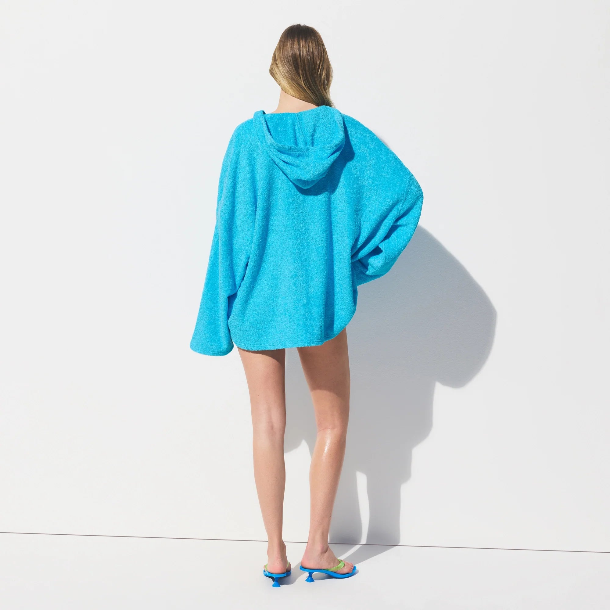 TERRY COVER-UPS OVERSIZED HOODIE | CYAN ON A MODEL FRONT VIEW @ | FOCUS: 0.0, 1.0, 0.9 