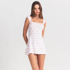 LOGO POINTELLE MINI DRESS | SNOW LACE HEARTS ON A MODEL SIDE VIEW @ | FOCUS: 0.0, 1.0, 0.9