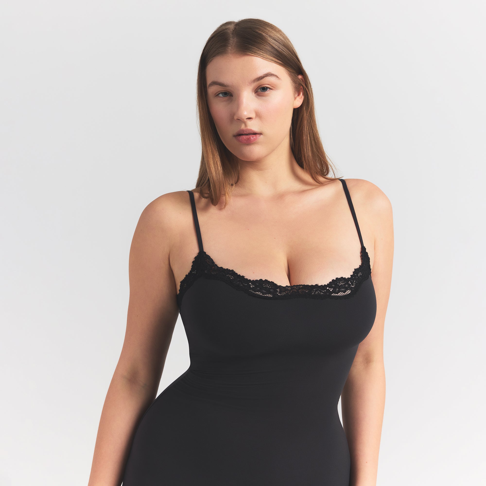 FITS EVERYBODY LACE LONG SLIP DRESS | ONYX ON A MODEL FRONT VIEW @ | FOCUS: 0.0, 1.0, 0.9