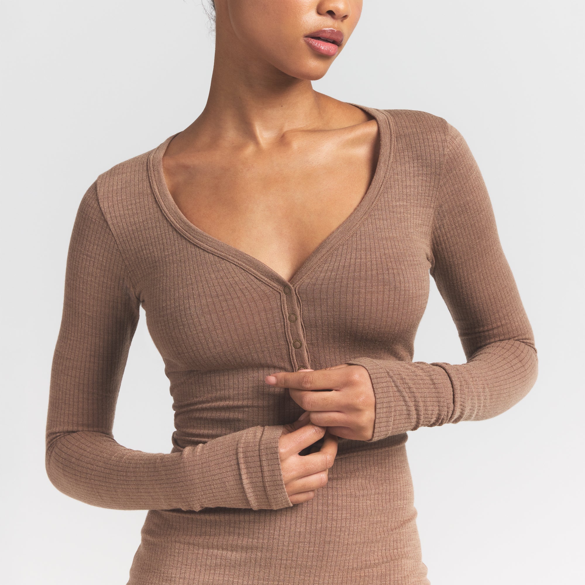 WOOL RIB HENLEY DRESS | SIENNA ON A MODEL FRONT VIEW S | FOCUS: 0.0, 1.0, 0.9