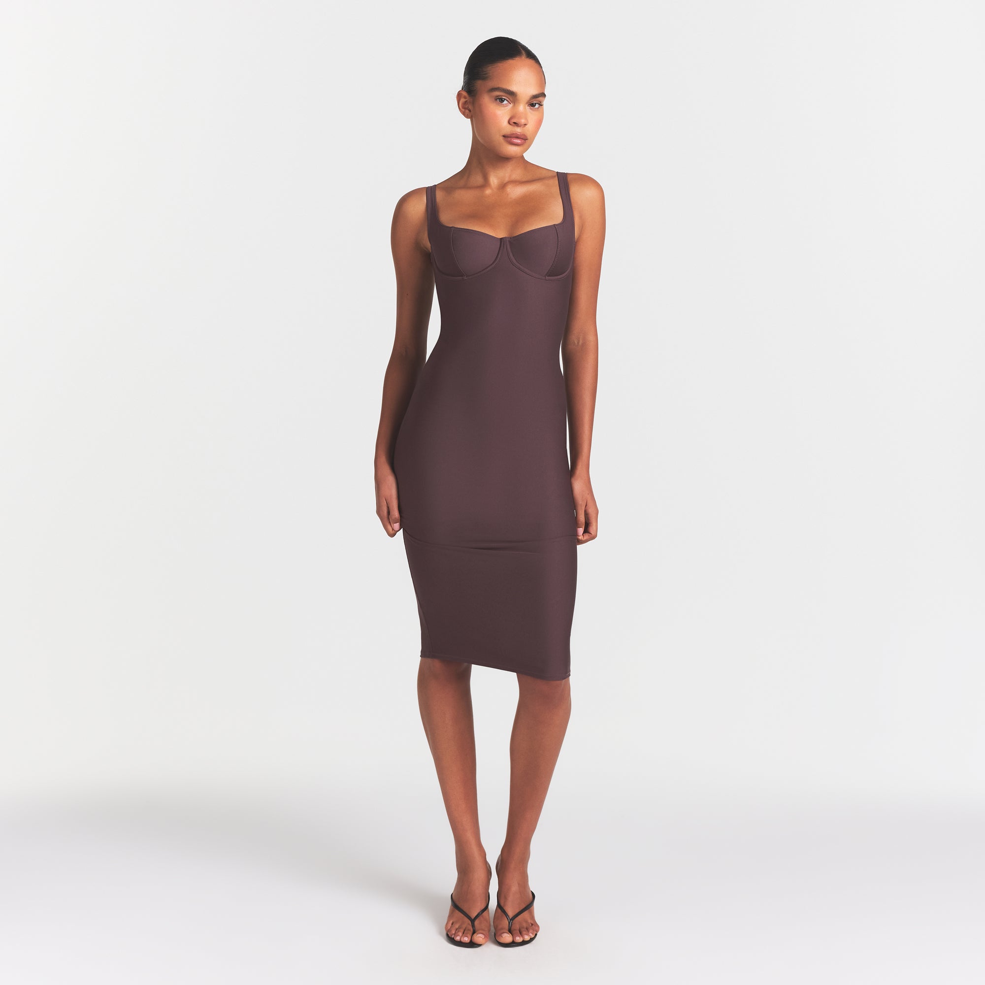 SKIMS BODY MIDI DRESS | RAISIN ON A MODEL FRONT VIEW @