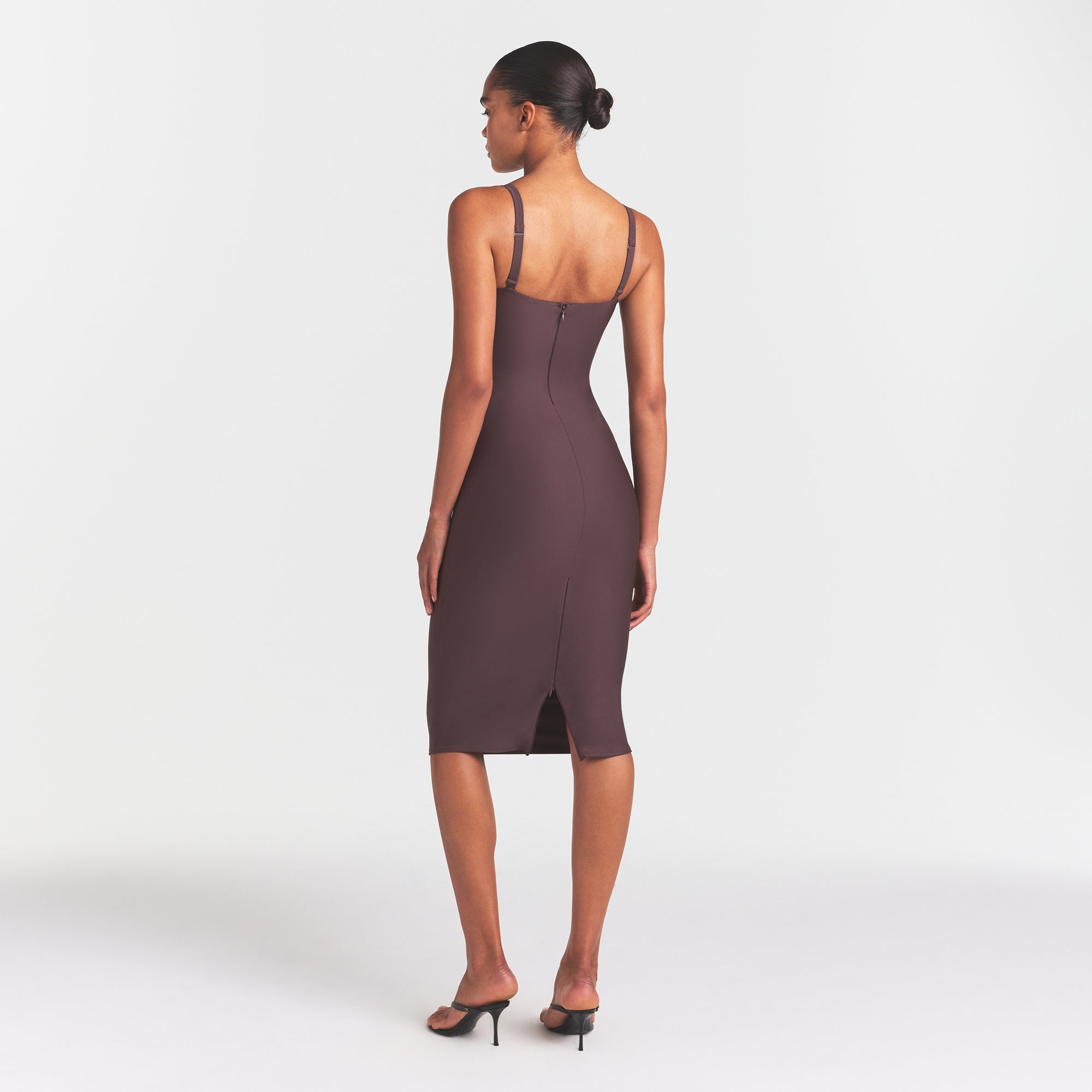 SKIMS BODY MIDI DRESS | RAISIN ON A MODEL FRONT VIEW @