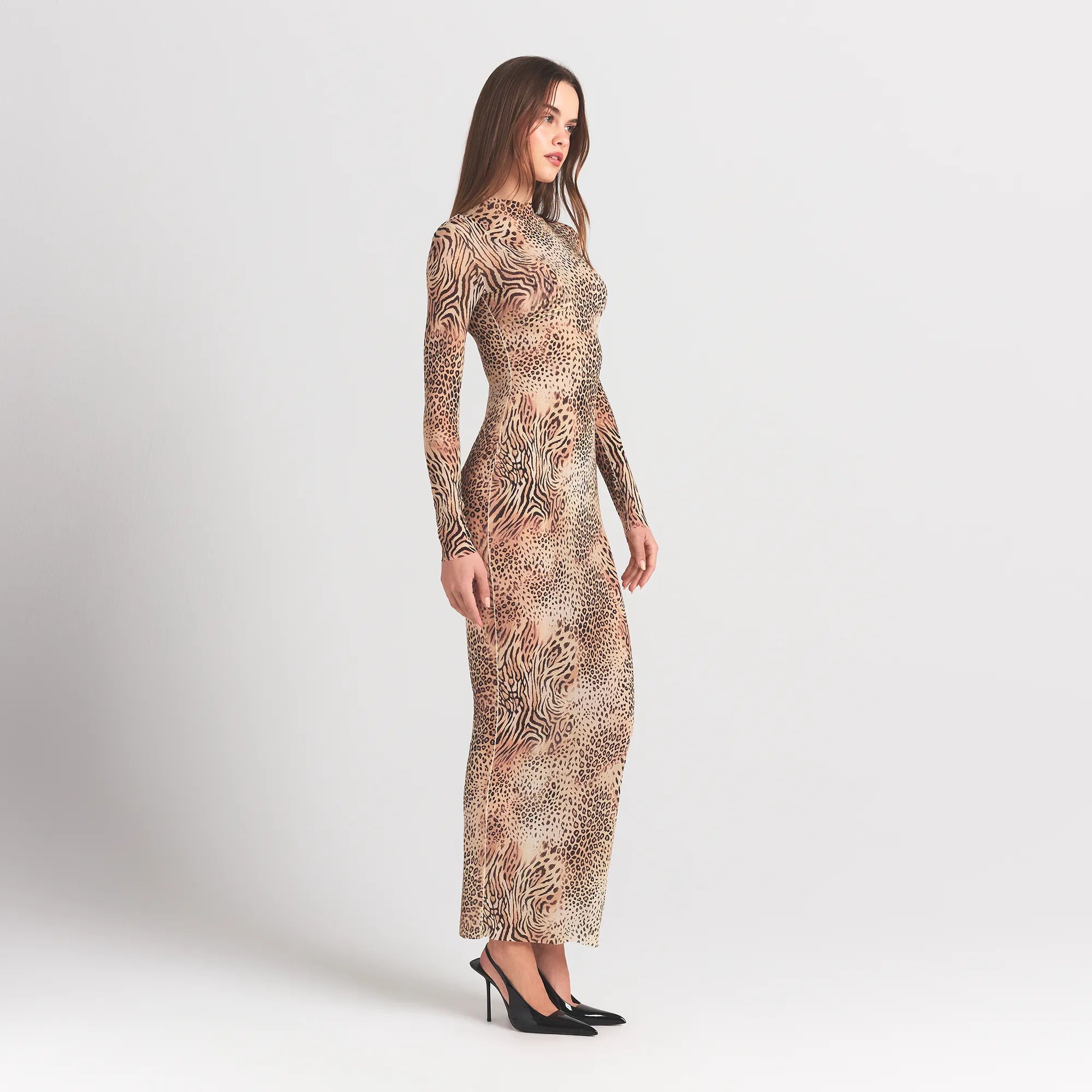 MILKY SHEER MOCK NECK LONG SLEEVE LONG DRESS | SAND MULTI ANIMAL ON A MODEL SIDE VIEW @ | FOCUS: 0.0, 1.0, 0.9