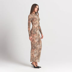 MILKY SHEER MOCK NECK LONG SLEEVE LONG DRESS | SAND MULTI ANIMAL ON A MODEL SIDE VIEW @ | FOCUS: 0.0, 1.0, 0.9