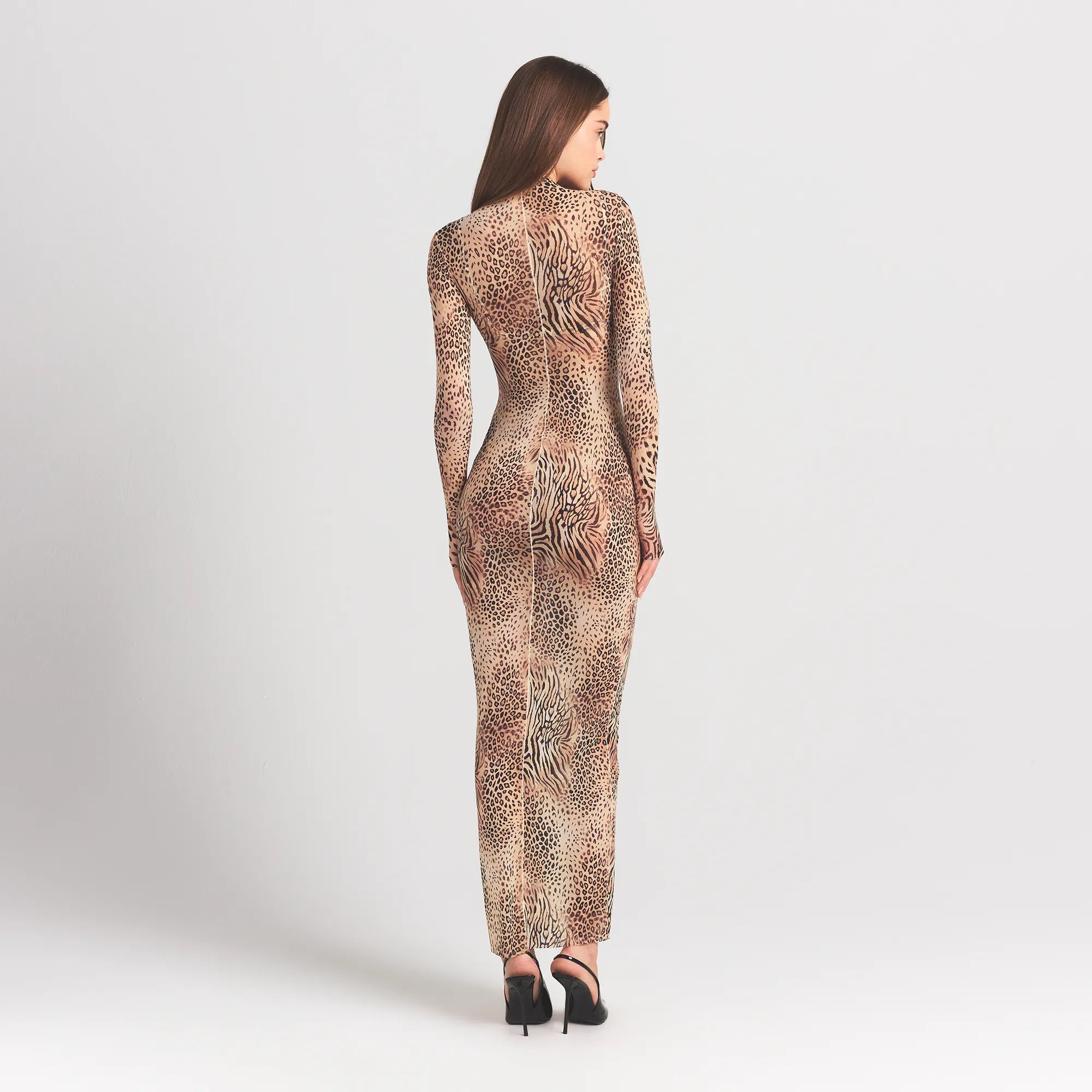 MILKY SHEER MOCK NECK LONG SLEEVE LONG DRESS | SAND MULTI ANIMAL ON A MODEL SIDE VIEW @ | FOCUS: 0.0, 1.0, 0.9