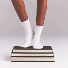 RIBBED QUARTER CREW LOGO SOCK | SNOW AND CHERRY BLOSSOM ON A MODEL | FOCUS: 0.0, 1.0, 0.9