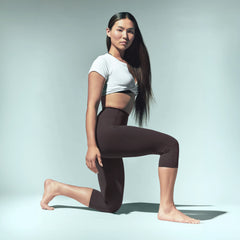NikeSKIMS STUDIO STRETCH 17" CAPRI LEGGING | DARK ROAST ON A MODEL CAMPAIGN IMAGERY @ | FOCUS: 0.0, 1.0, 0.9