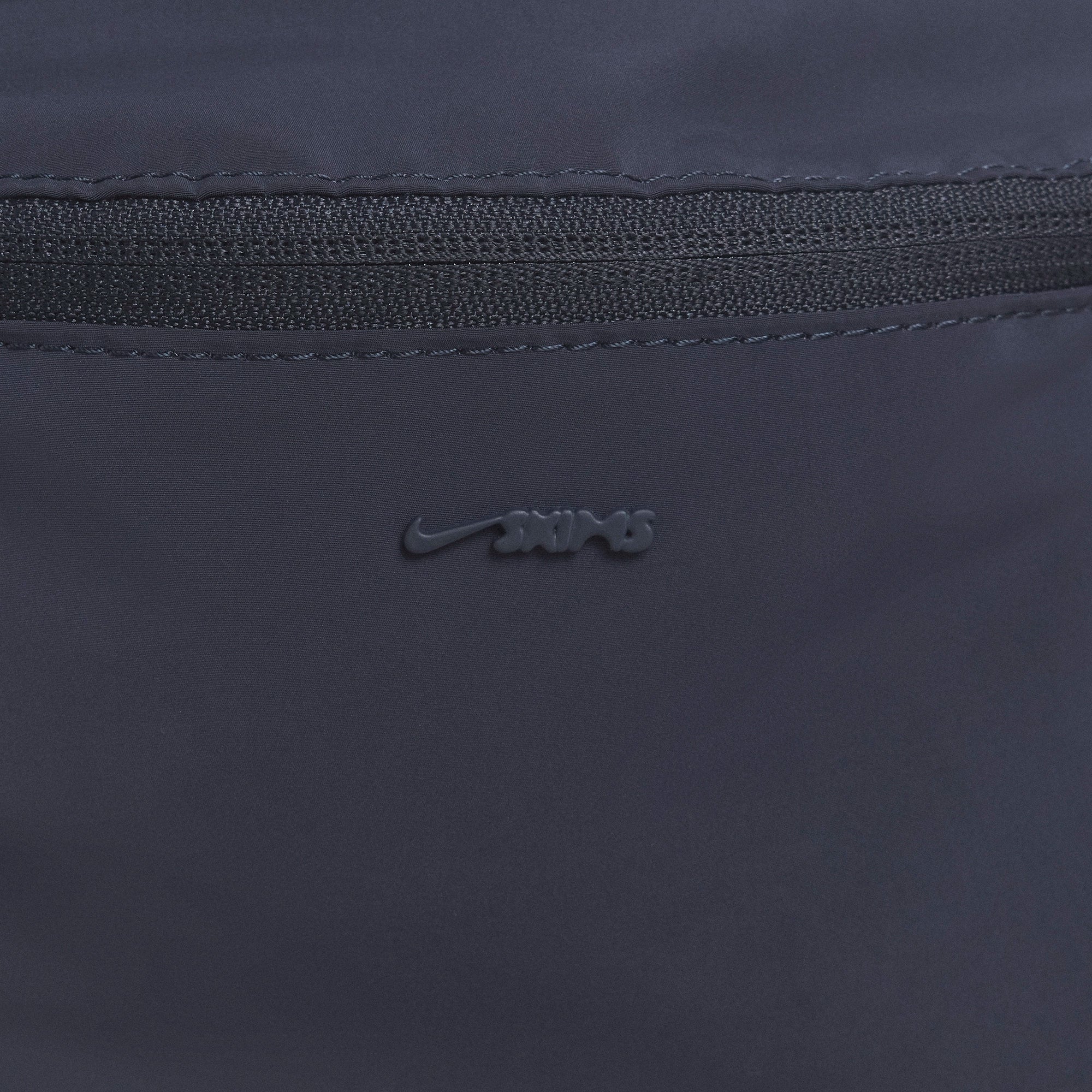 NikeSKIMS ACCESSORIES FANNY PACK | DEEP ROYAL ON A MODEL FRONT VIEW @ | FOCUS: 0.0, 1.0, 0.9
