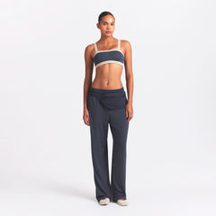 NikeSKIMS ACCESSORIES FANNY PACK | DEEP ROYAL ON A MODEL FRONT VIEW @ | FOCUS: 0.0, 1.0, 0.9