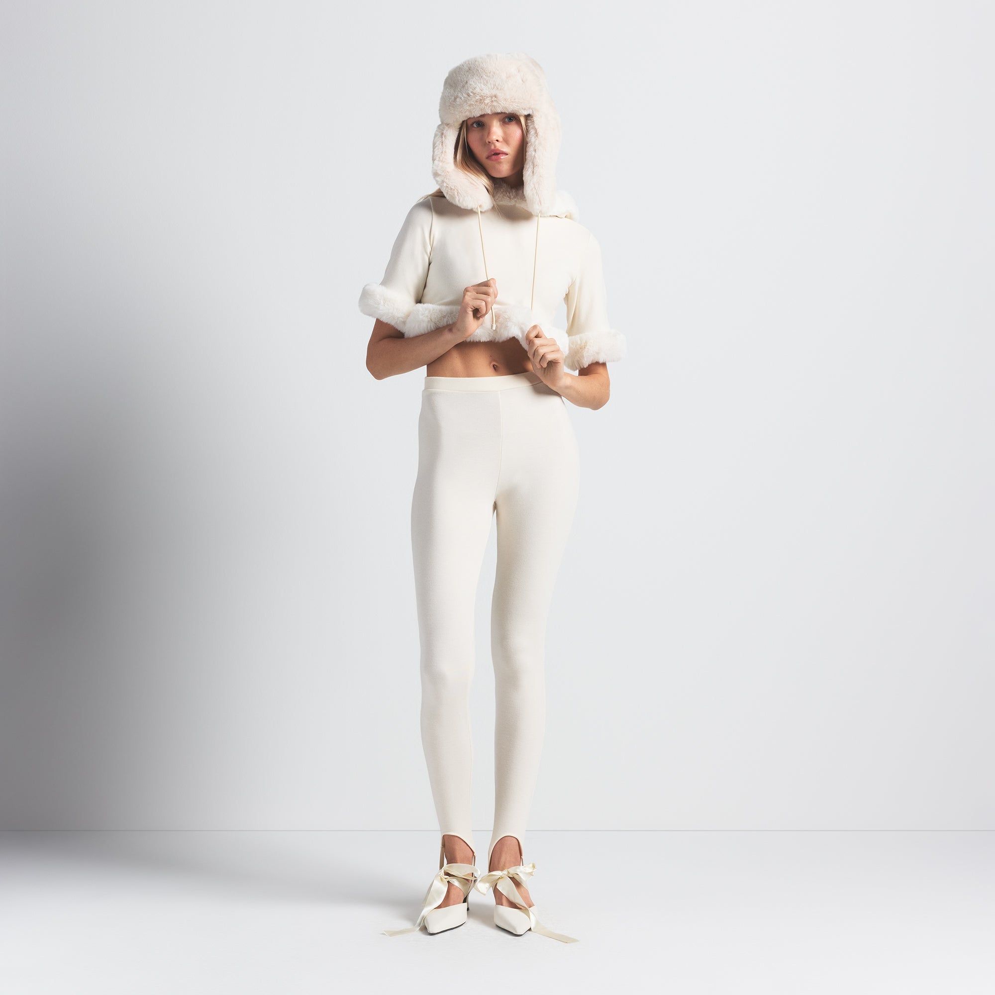FAUX FUR TRAPPER HAT | EGRET ON A MODEL FRONT VIEW @ | FOCUS: 0.0, 1.0, 0.9