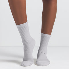 NikeSKIMS ACCESSORIES DRI-FIT™ CREW SOCK 3-PACK | HEATHER GREY MULTI & LAYS FLAT ON A WHITE BACKGROUND | FLT