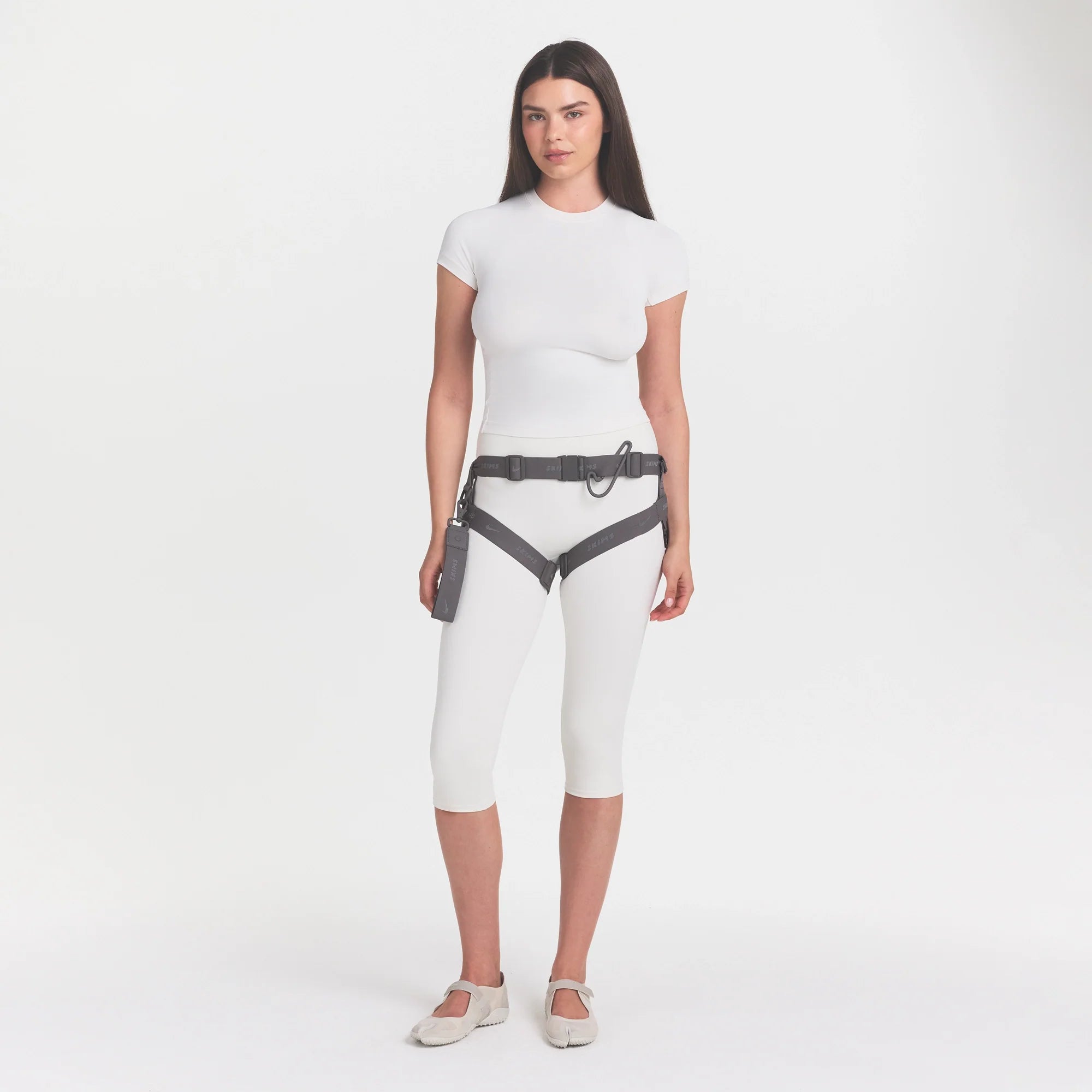NikeSKIMS MATTE PADDED BABY TEE | IVORY ON A MODEL 