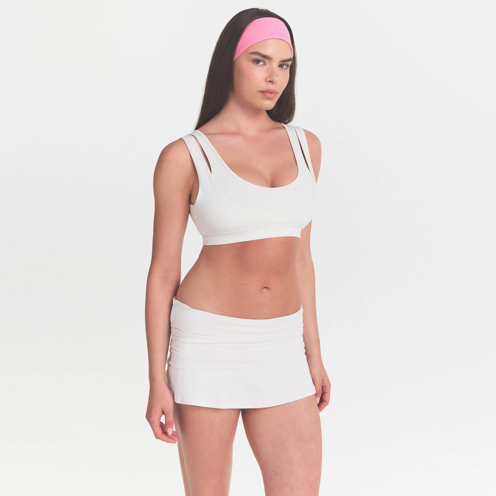 NikeSKIMS MATTE DOUBLE STRAP SCOOP BRA | IVORY ON A MODEL 