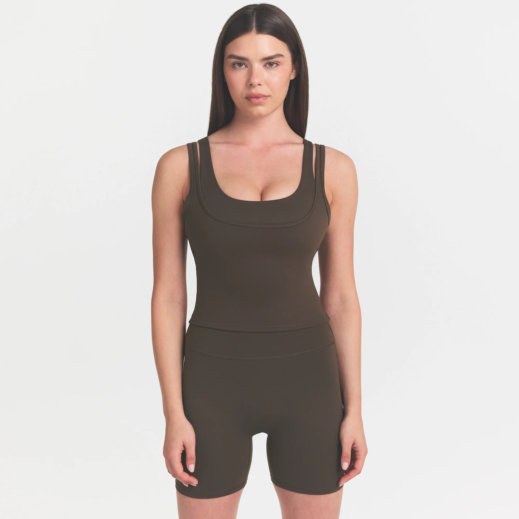 NikeSKIMS MATTE DOUBLE STRAP SCOOP TANK | DARK SEPIA ON A MODEL FRONT VIEW @ | FOCUS: 0.0, 1.0, 0.9