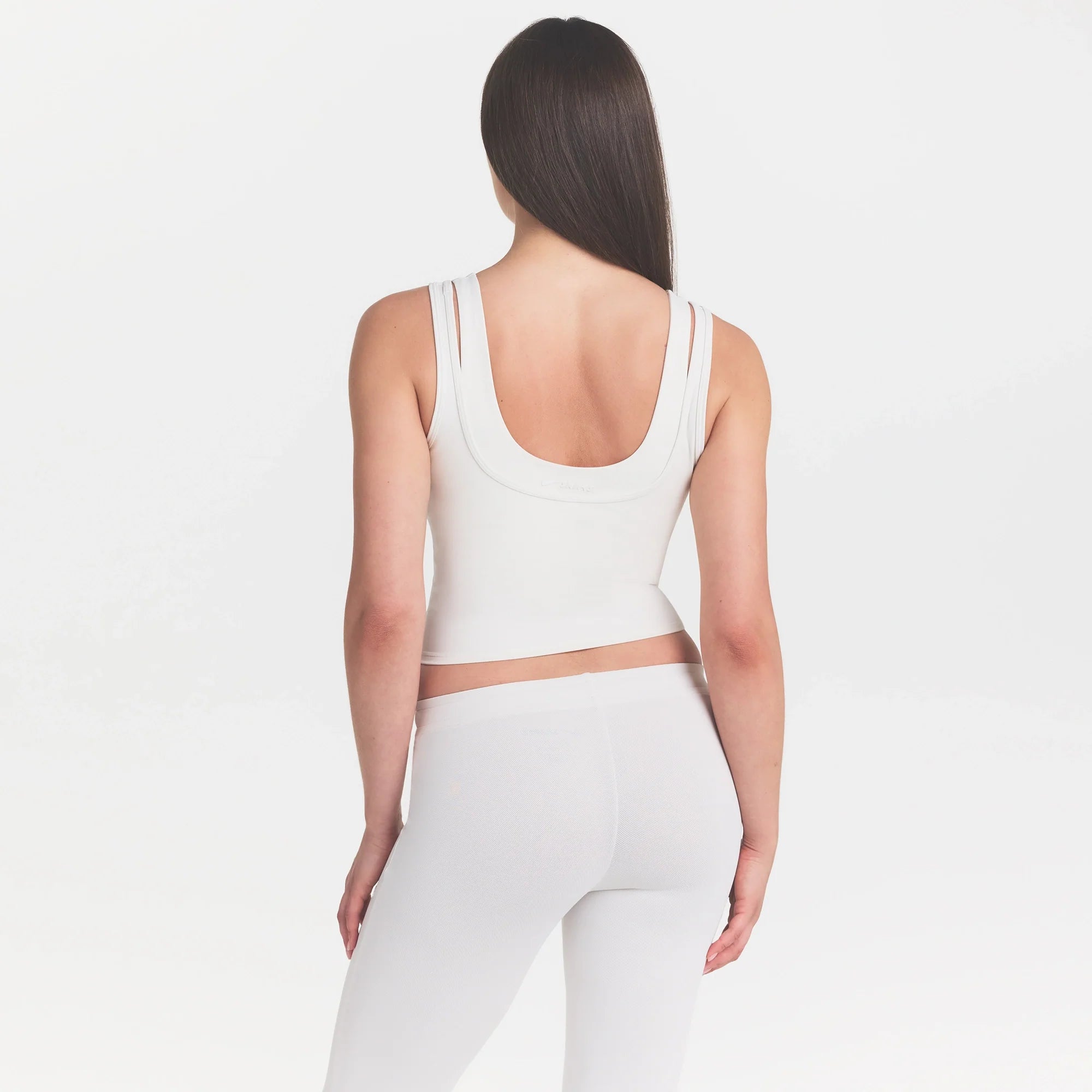 NikeSKIMS MATTE DOUBLE STRAP SCOOP TANK | IVORY ON A MODEL 