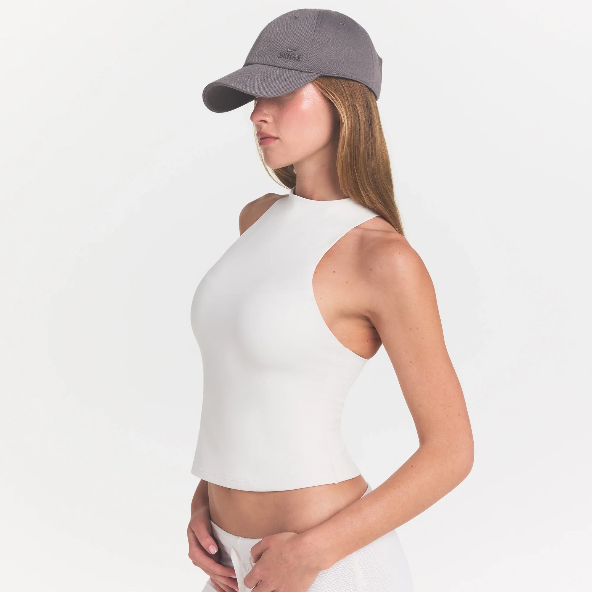 NikeSKIMS MATTE MOCK NECK RACER TANK | IVORY ON A MODEL 