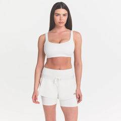NikeSKIMS MATTE SCOOP NECK BRA | IVORY ON A MODEL 