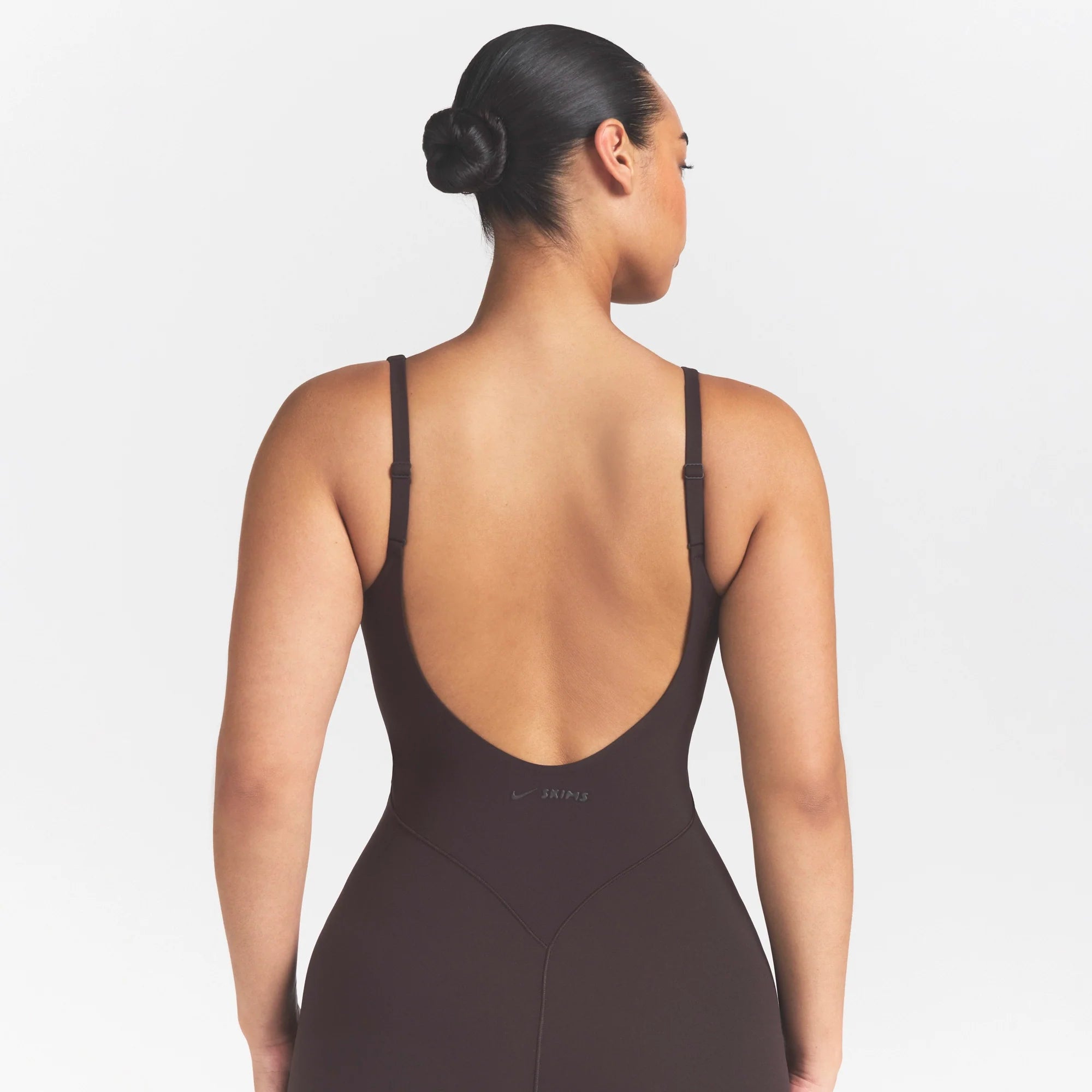 NikeSKIMS STUDIO STRETCH LONG 29" ONE PIECE | DARK ROASTON A MODEL FRONT 