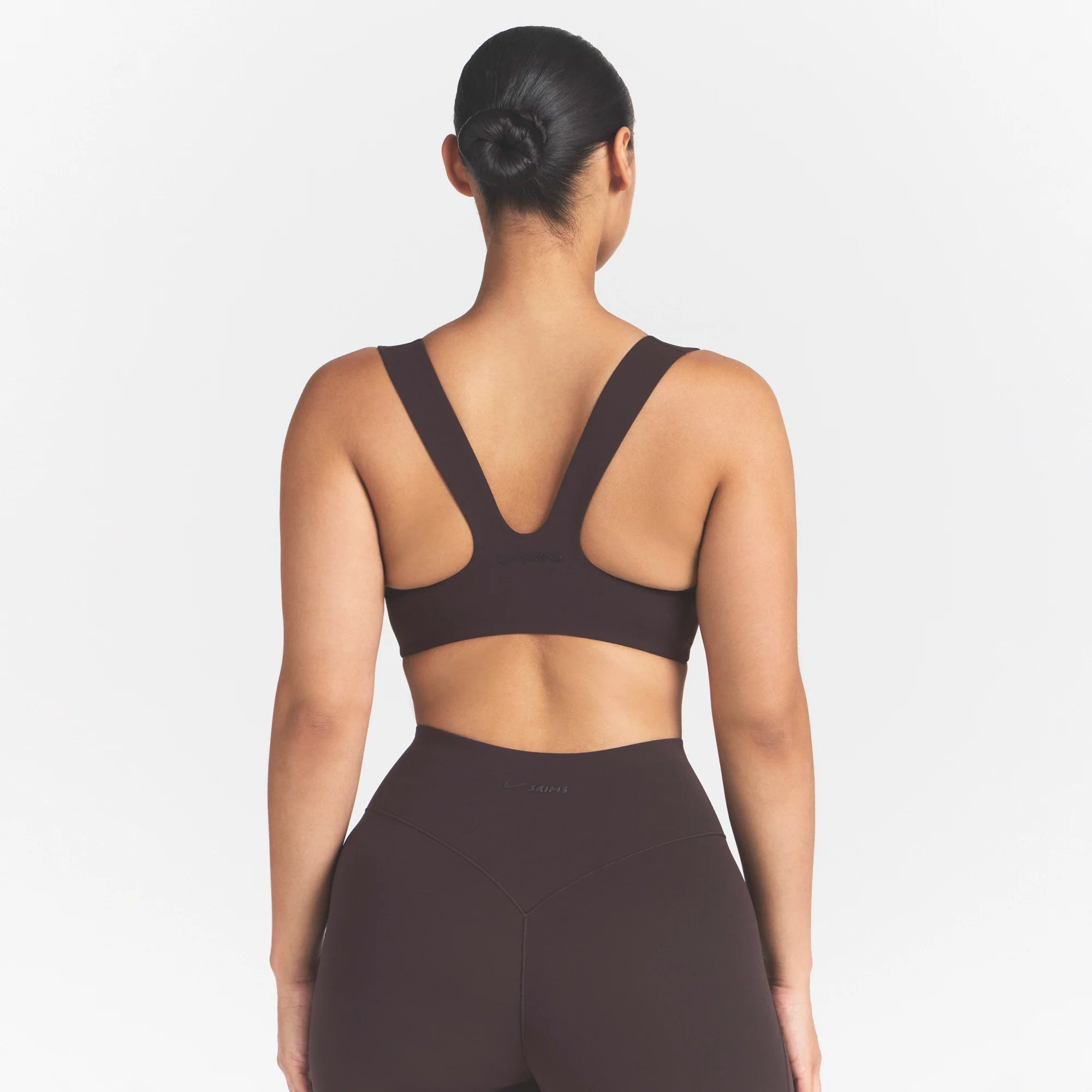 NikeSKIMS STUDIO STRETCH SQUARE NECK RACER BRA | DARK ROASTON A MODEL FRONT 