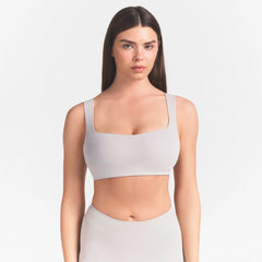 NikeSKIMS STUDIO STRETCH SQUARE NECK RACER BRA | LINENON A MODEL FRONT 