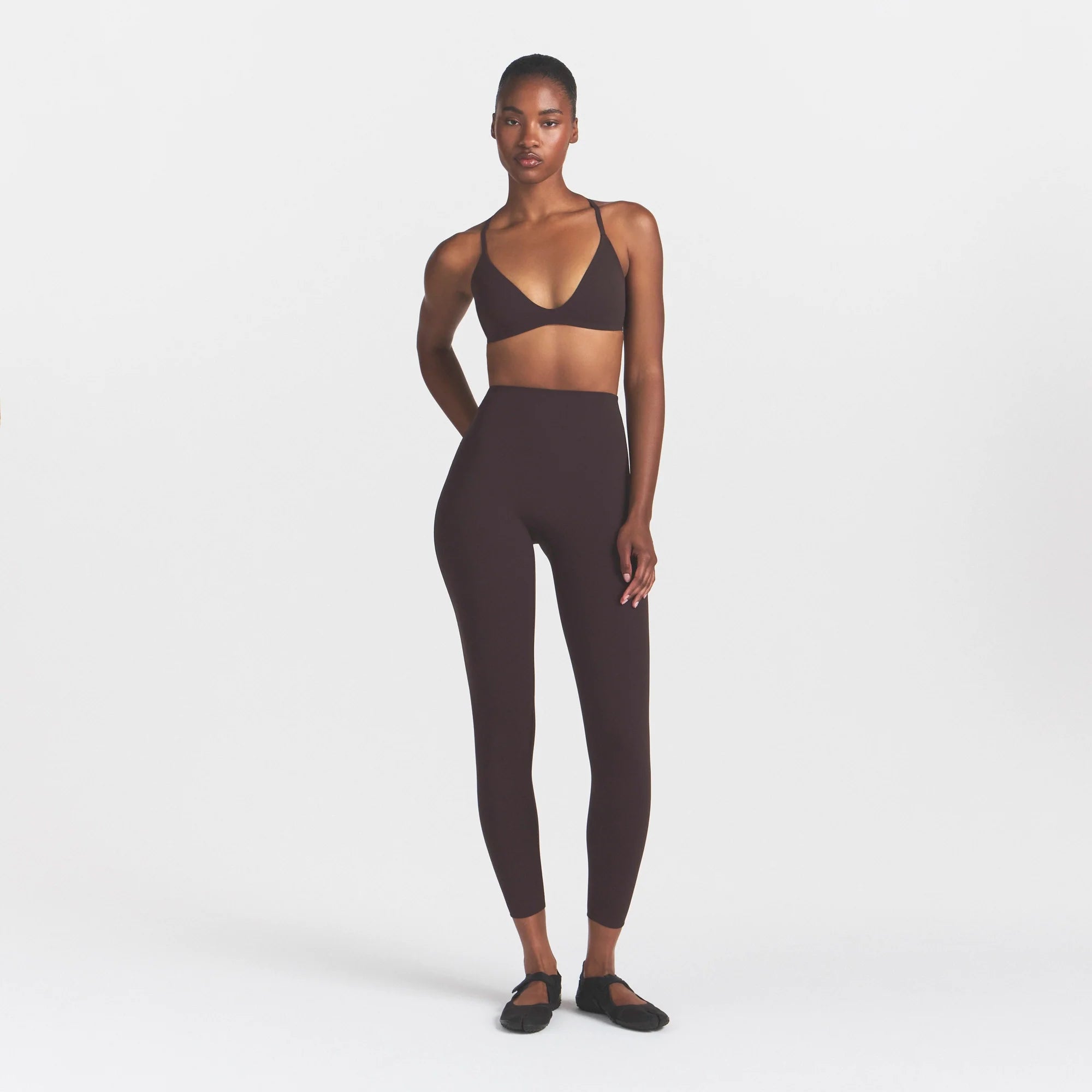 NikeSKIMS STUDIO STRETCH 26" LEGGING | DARK ROASTON A MODEL FRONT 
