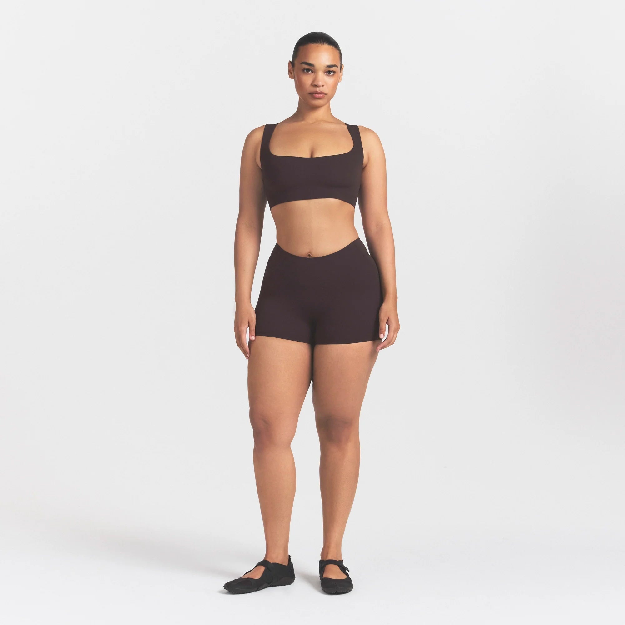 NikeSKIMS STUDIO STRETCH DIP FRONT 2" SHORT | DARK ROASTON A MODEL FRONT 