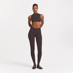NikeSKIMS STUDIO STRETCH DIP FRONT 29" LEGGING | DARK ROASTON A MODEL FRONT 
