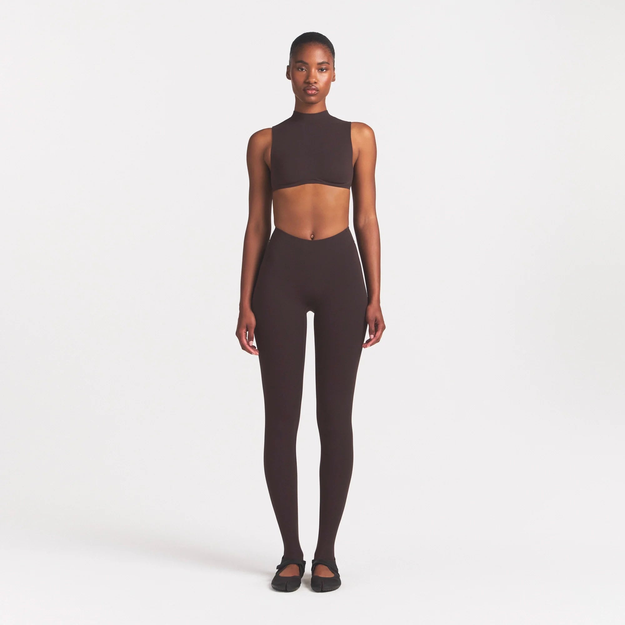 NikeSKIMS STUDIO STRETCH MOCK NECK BRA | DARK ROASTON A MODEL FRONT 