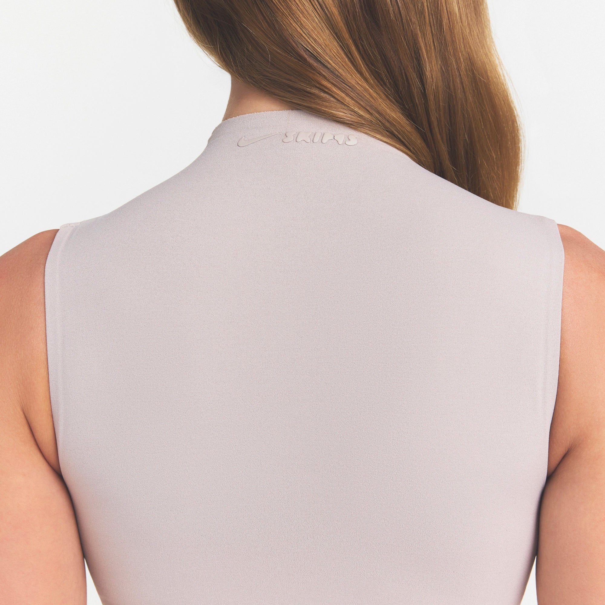 NikeSKIMS STUDIO STRETCH MOCK NECK BRA | LINENON A MODEL FRONT 