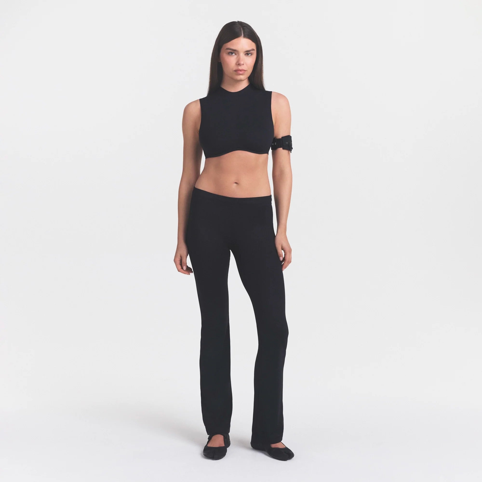 NikeSKIMS STUDIO STRETCH MOCK NECK BRA | OBSIDIANON A MODEL FRONT 