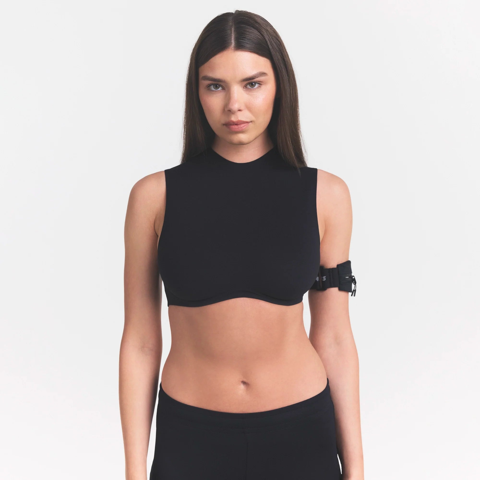 NikeSKIMS STUDIO STRETCH MOCK NECK BRA | OBSIDIANON A MODEL FRONT 
