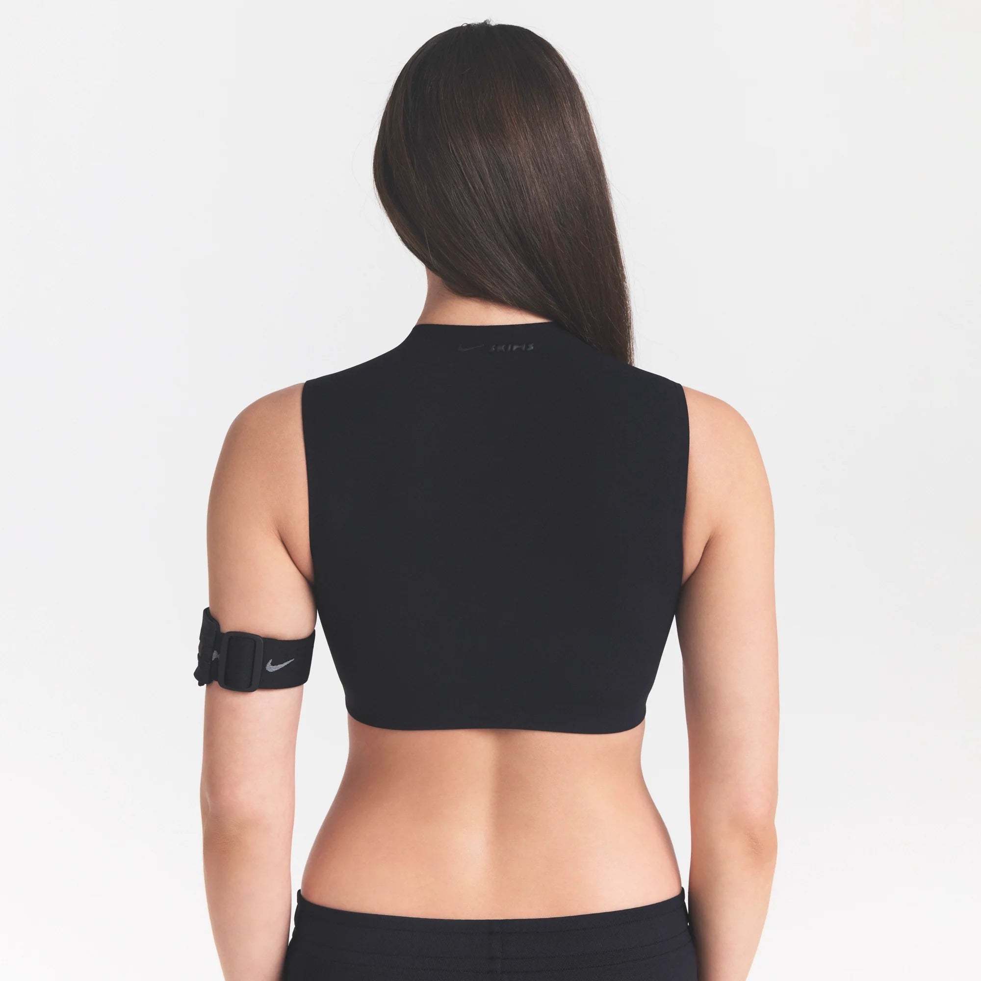NikeSKIMS STUDIO STRETCH MOCK NECK BRA | OBSIDIANON A MODEL FRONT 