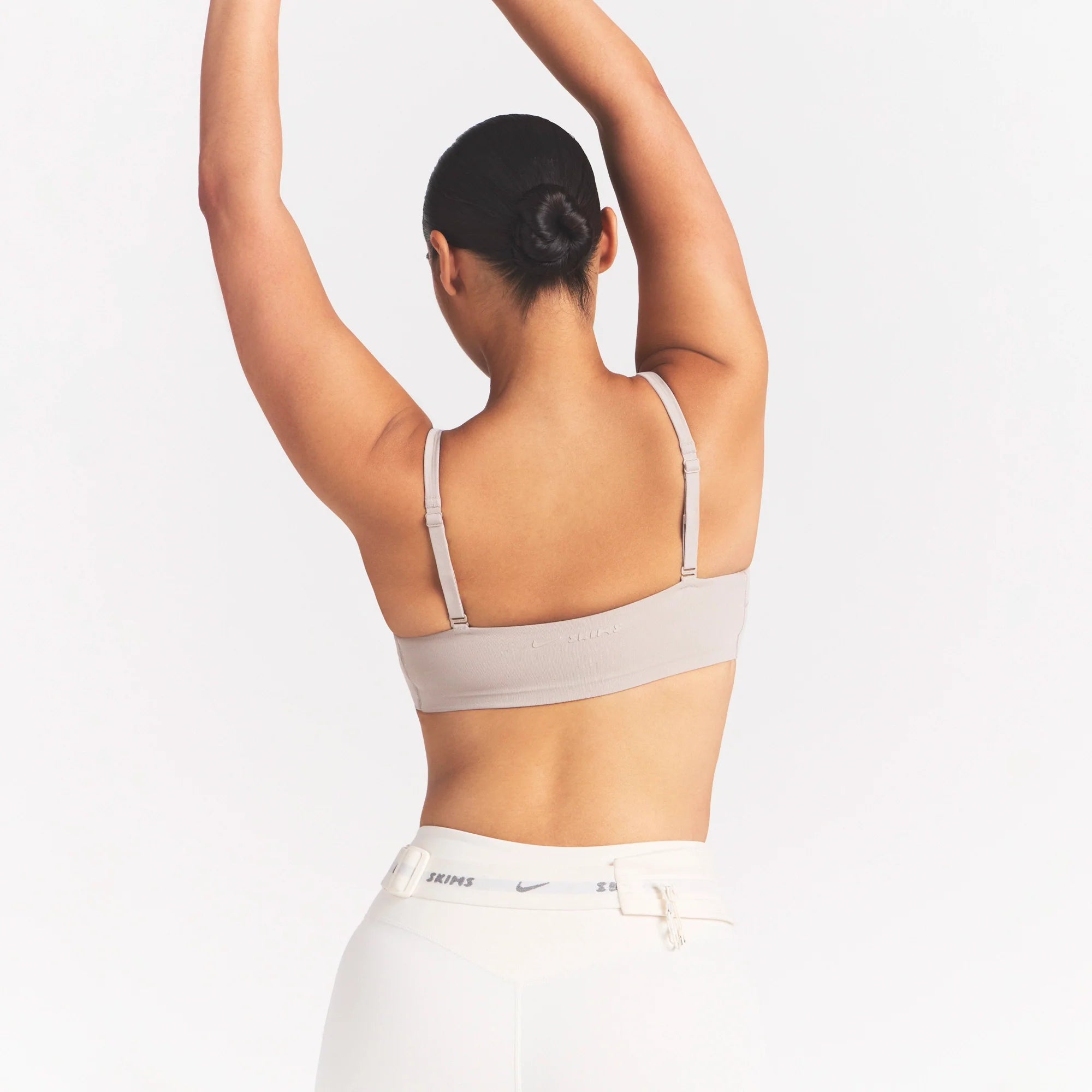 NikeSKIMS STUDIO STRETCH  SEAM FRONT MICRO BRA | LINENON A MODEL FRONT 