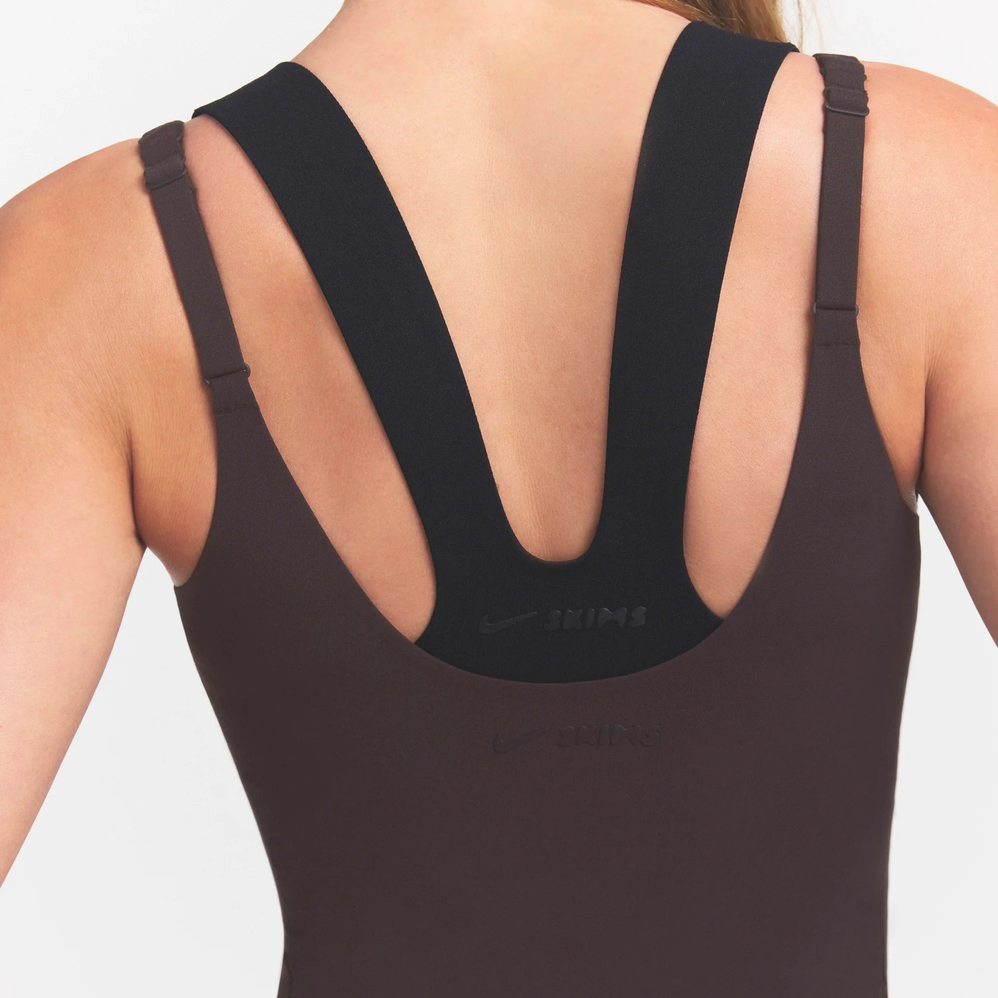 NikeSKIMS STUDIO STRETCH PLUNGE TANK | DARK ROASTON A MODEL FRONT 