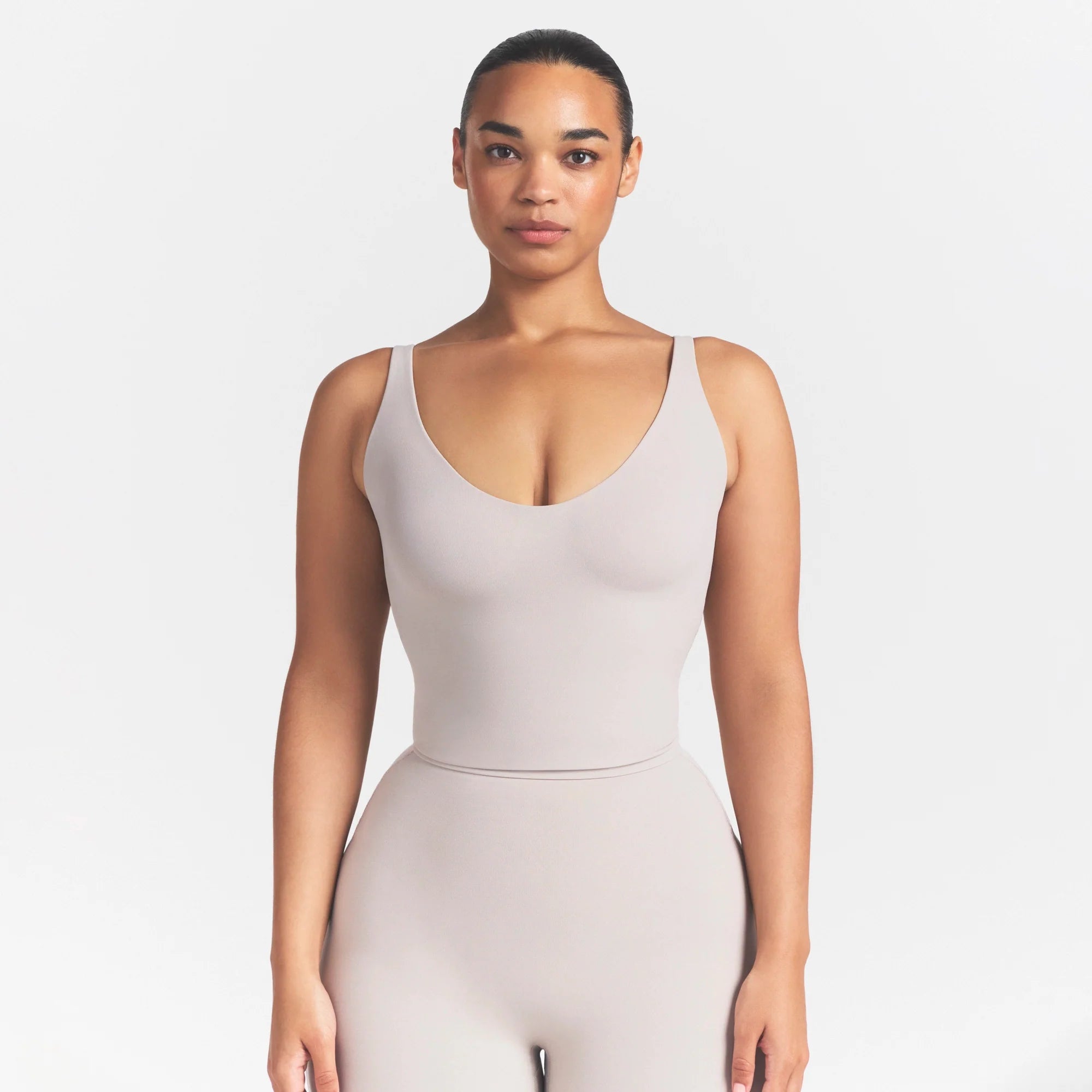 NikeSKIMS STUDIO STRETCH PLUNGE TANK | LINENON A MODEL FRONT 