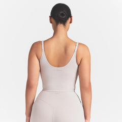 NikeSKIMS STUDIO STRETCH PLUNGE TANK | LINENON A MODEL FRONT 
