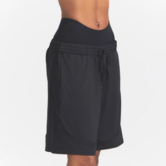 NikeSKIMS AIRY RELAXED SHORT | NSKM OBSIDIAN ON A MODEL 