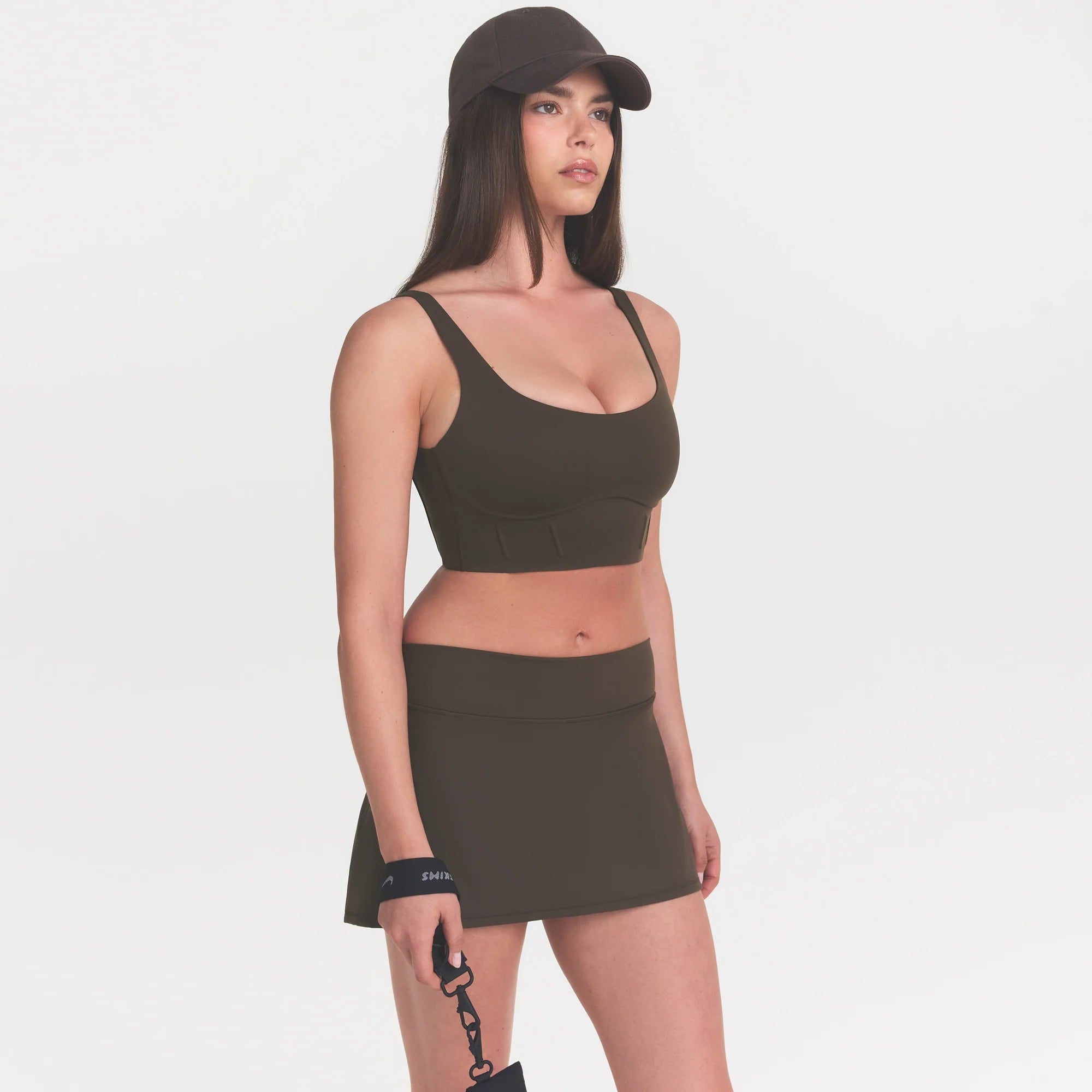 NikeSKIMS MATTE CORSET LONGLINE BRA | DARK SEPIA ON A MODEL 