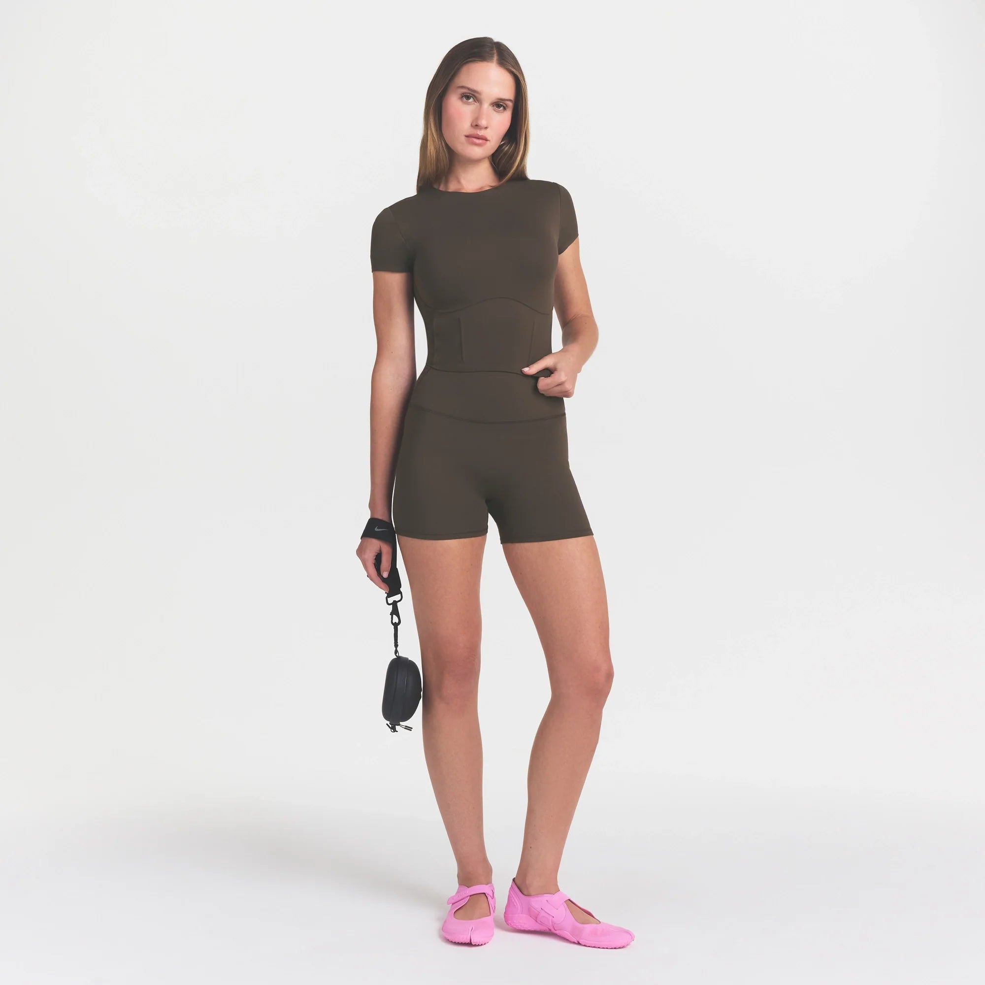 NikeSKIMS MATTE CORSET CROP TOP | DARK SEPIA ON A MODEL 