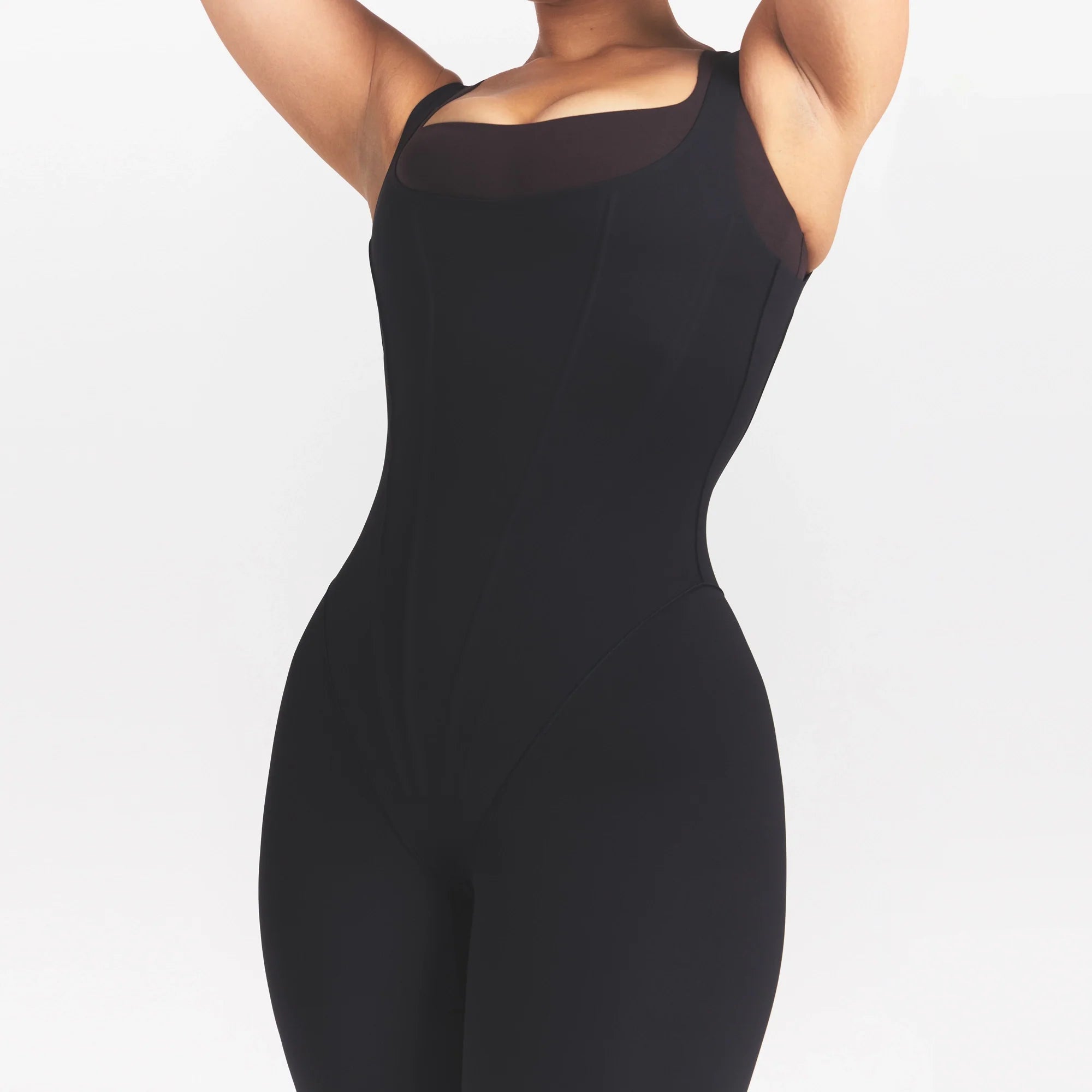 NikeSKIMS MATTE CORSET 29" ONE PIECE | OBSIDIAN ON A MODEL 