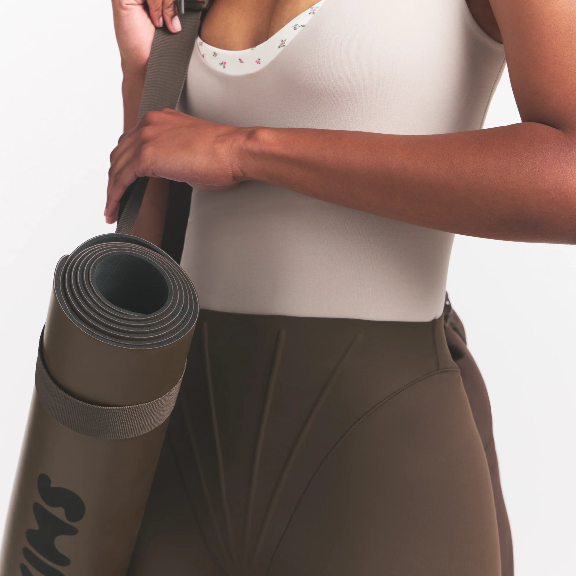 NikeSKIMS MATTE HIGH WAIST CORSET 26" LEGGING | DARK SEPIA ON A MODEL 
