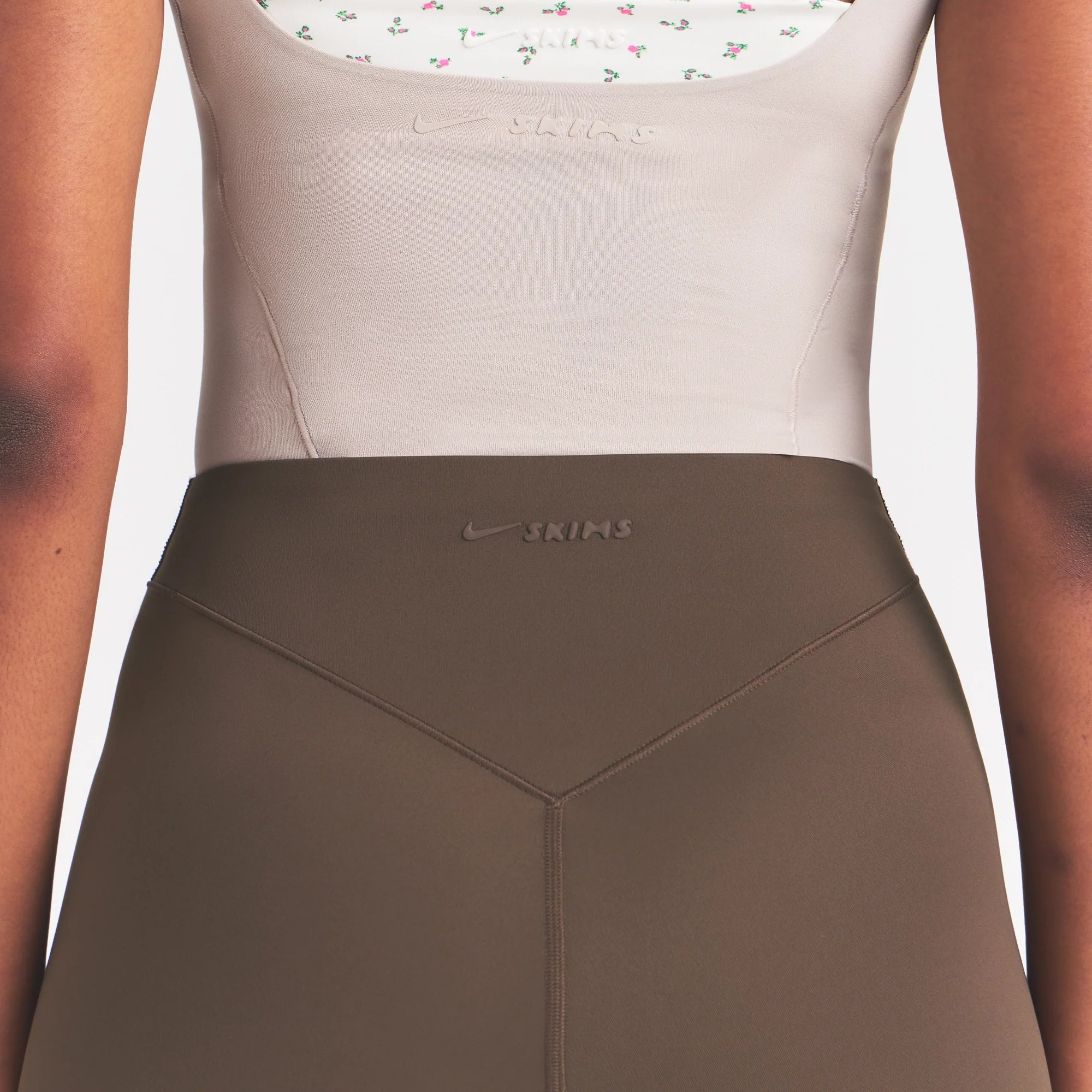 NikeSKIMS MATTE HIGH WAIST CORSET 26" LEGGING | DARK SEPIA ON A MODEL 