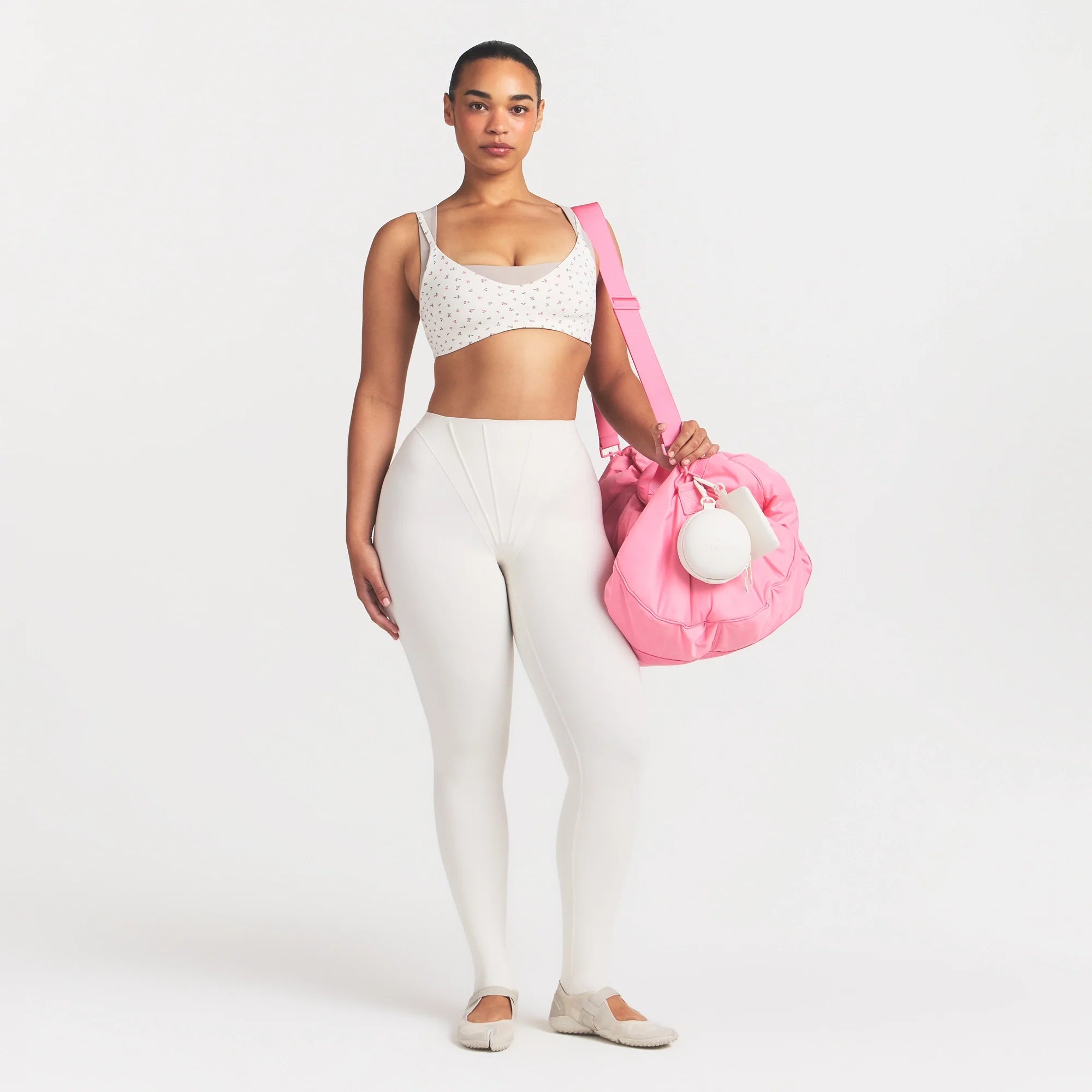 NikeSKIMS MATTE HIGH WAIST CORSET 26" LEGGING | IVORY ON A MODEL 