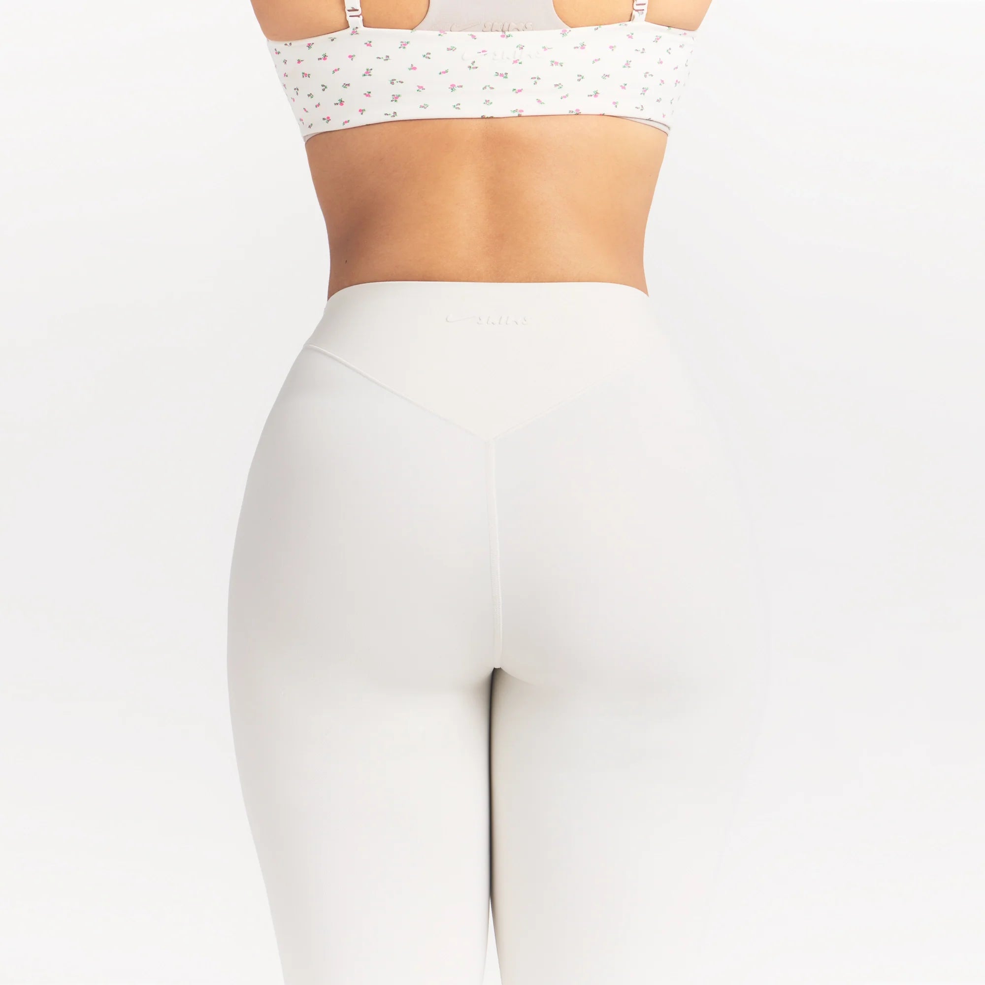 NikeSKIMS MATTE HIGH WAIST CORSET 26" LEGGING | IVORY ON A MODEL 