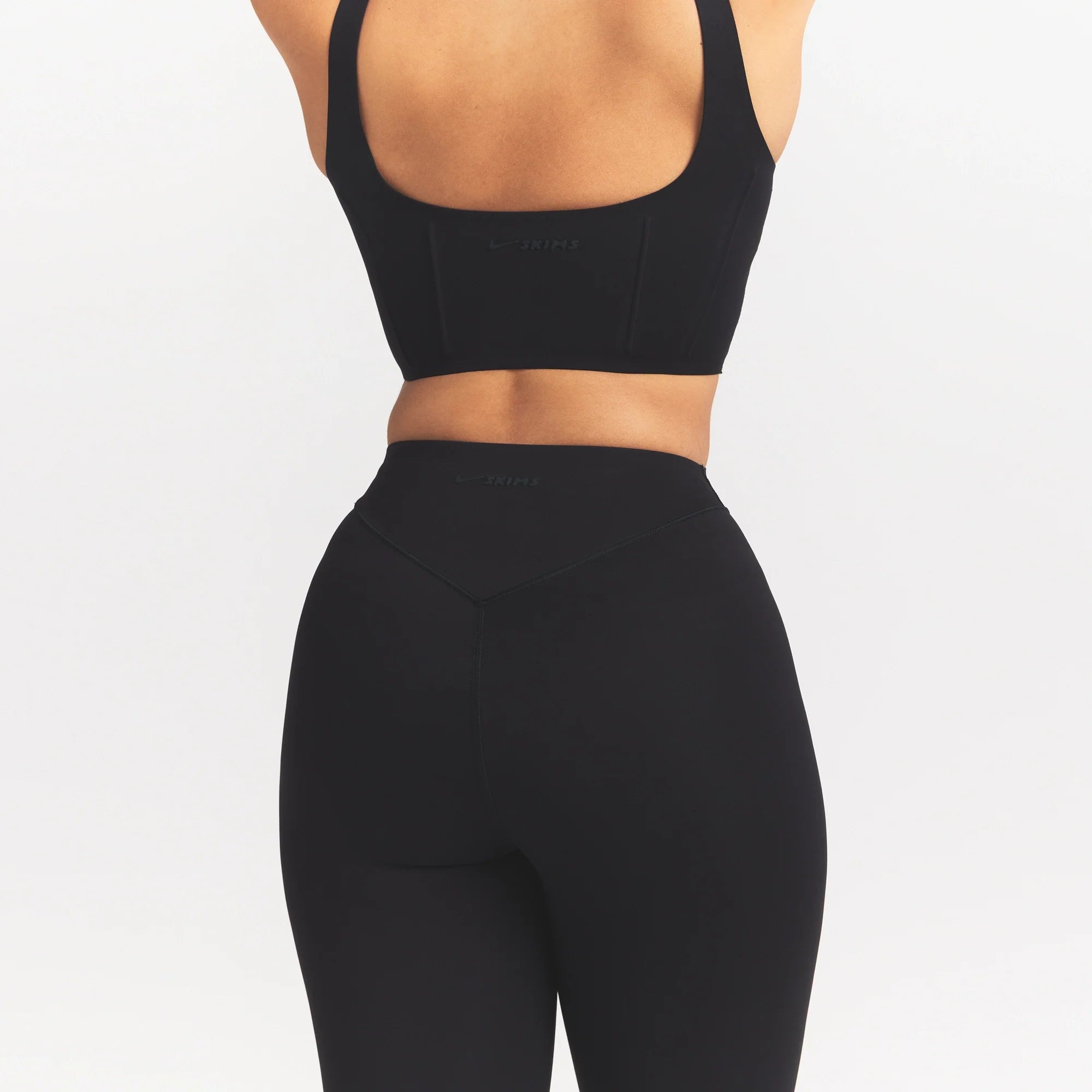 NikeSKIMS MATTE HIGH WAIST CORSET 26" LEGGING | OBSIDIAN ON A MODEL 
